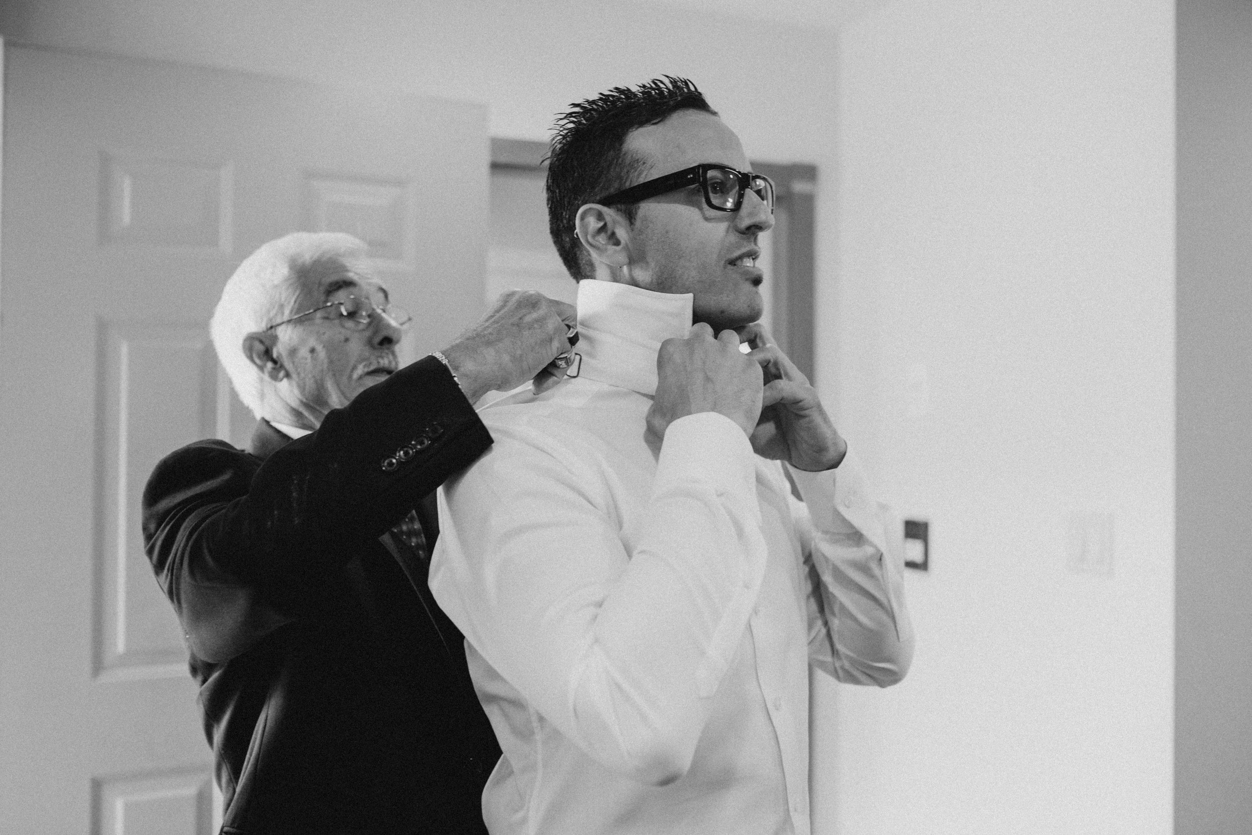 Getting help in fixing for Groom's suite Galiano Inn Wedding
