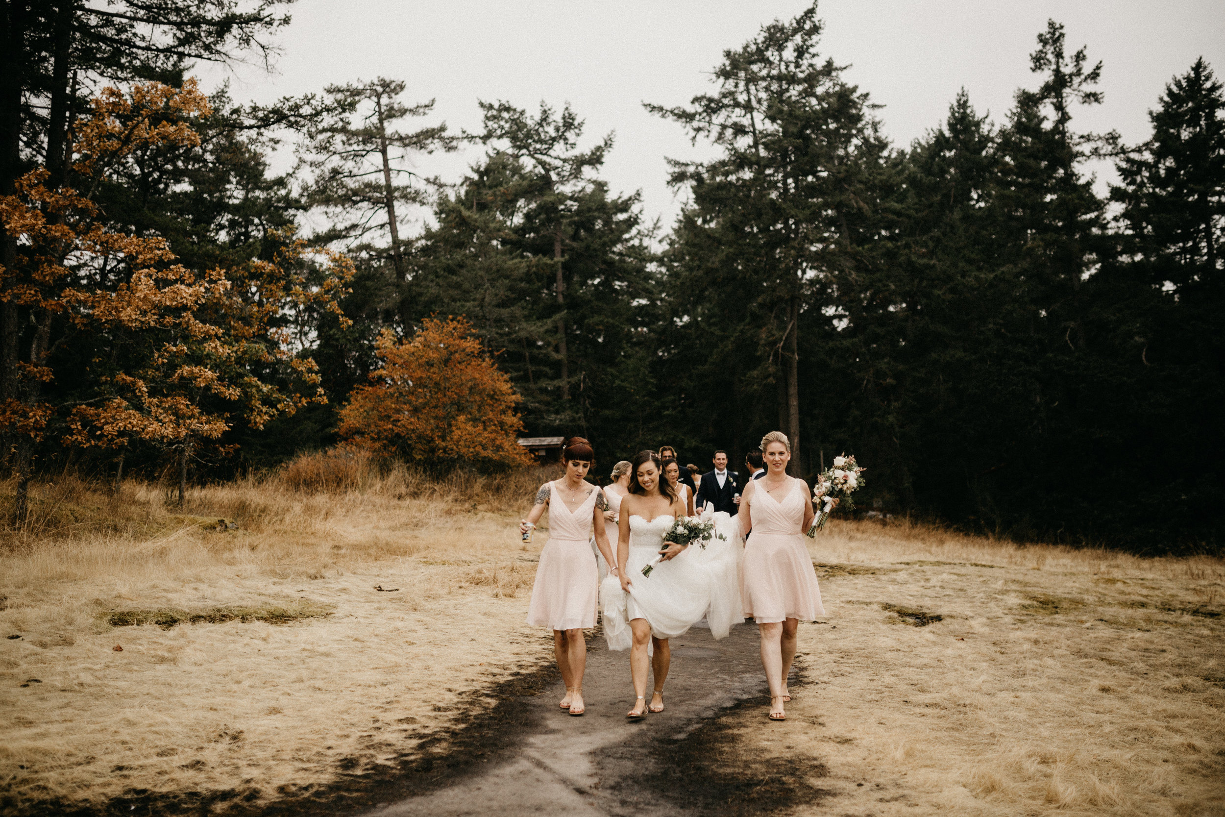 The Bridesmaids walking in the forest path Galiano Island Wedding