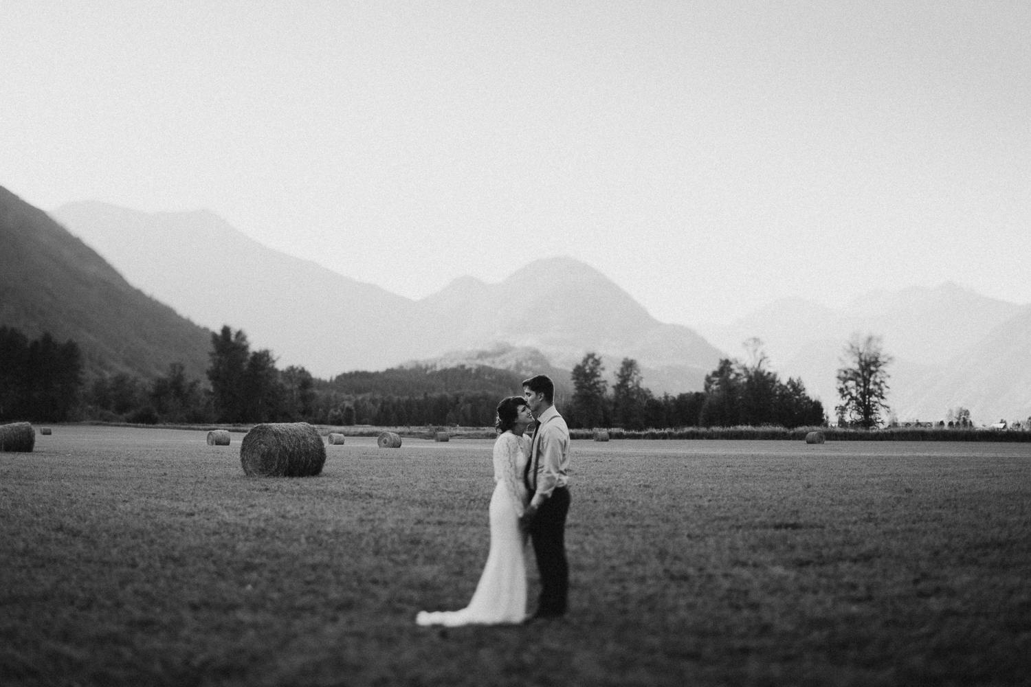 Couple embraces at Pemberton farm wedding