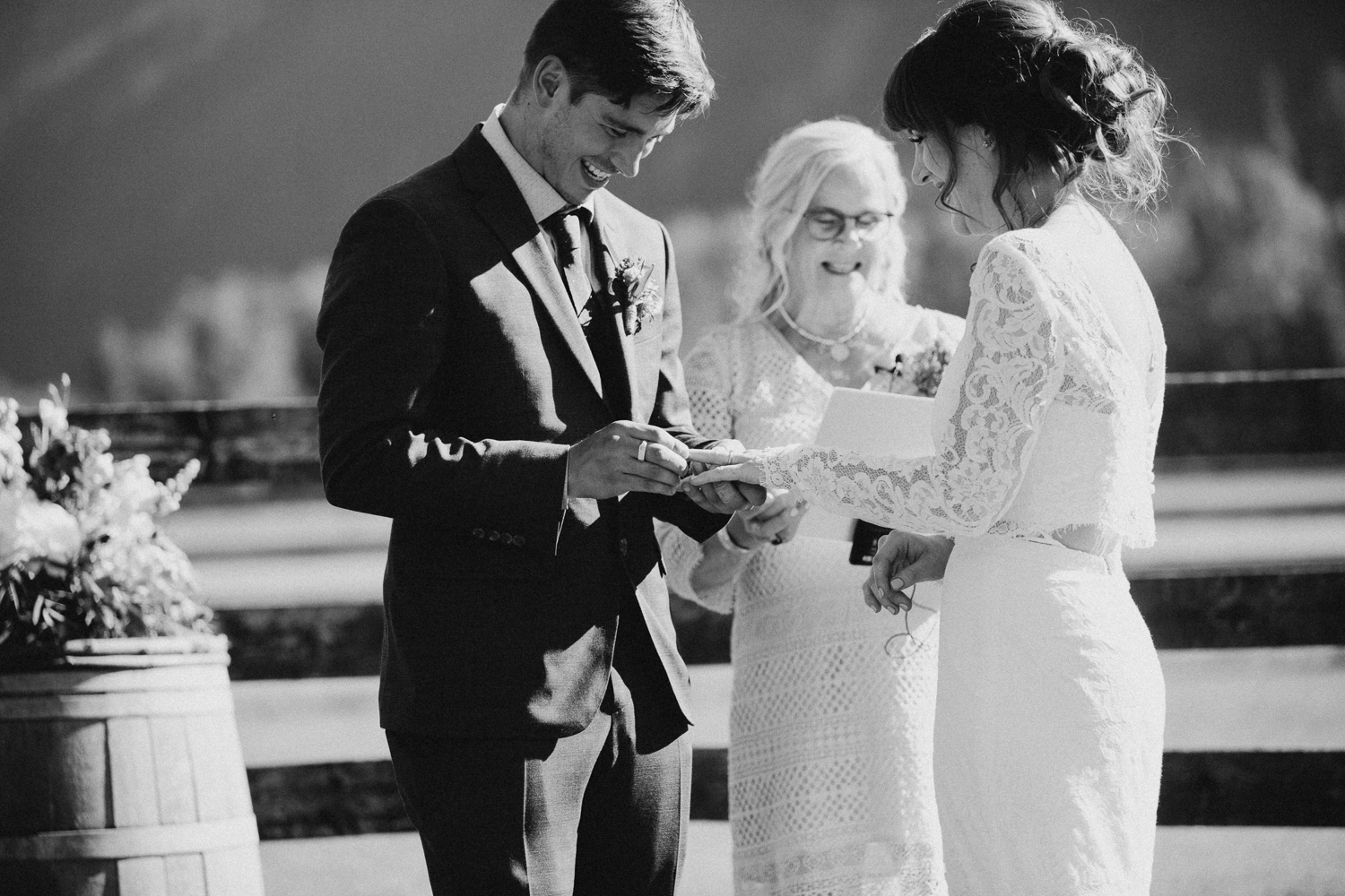 Couple exchanging rings Pemberton Farm Wedding