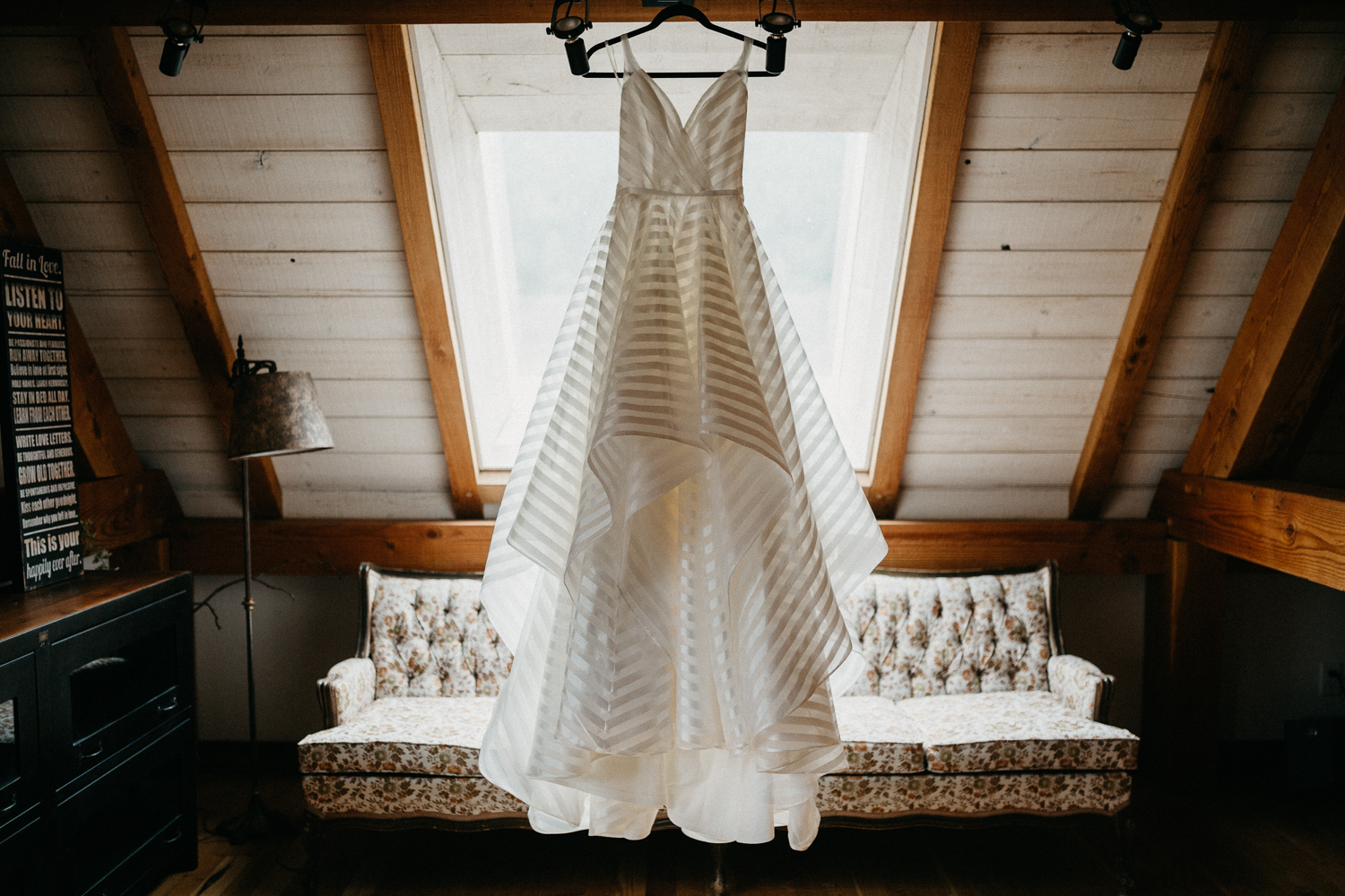 Wedding dress hanging at Bird's Eye Cove wedding, Vancouver Island