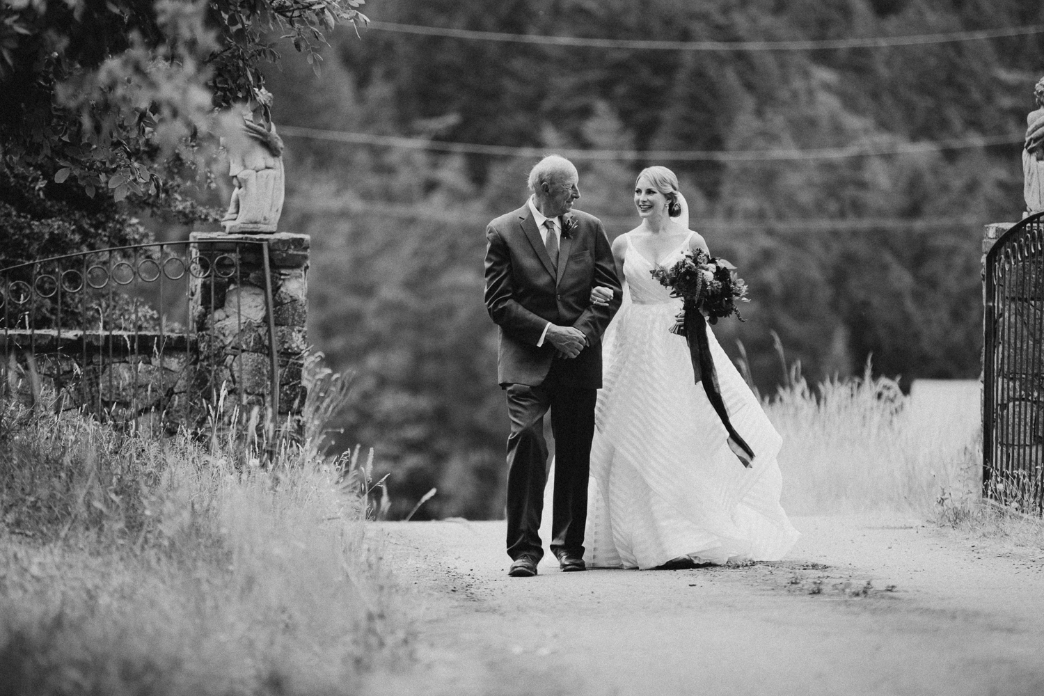 bride and father at ceremony at Bird's Eye Cove wedding, Vancouver Island