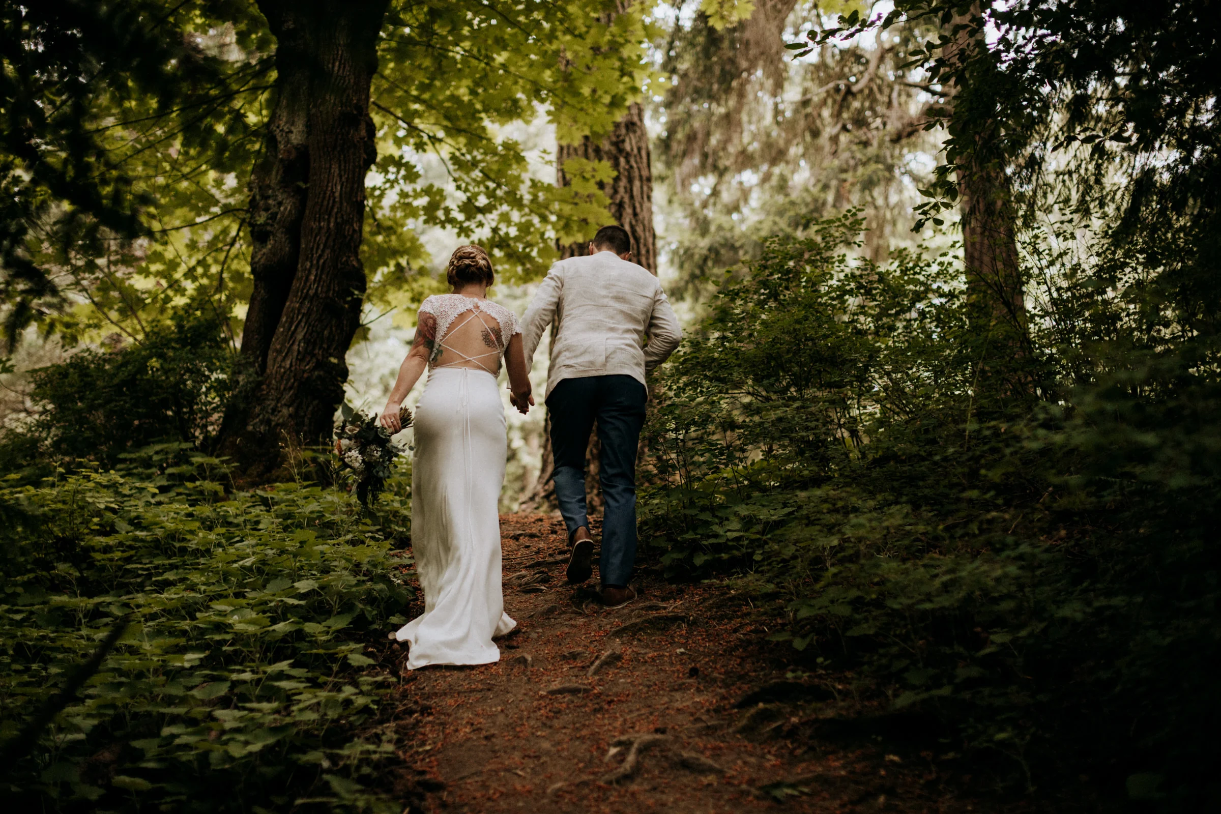 bride and groom leave forest at Mount Douglas Vancouver Island Elopement Photographer