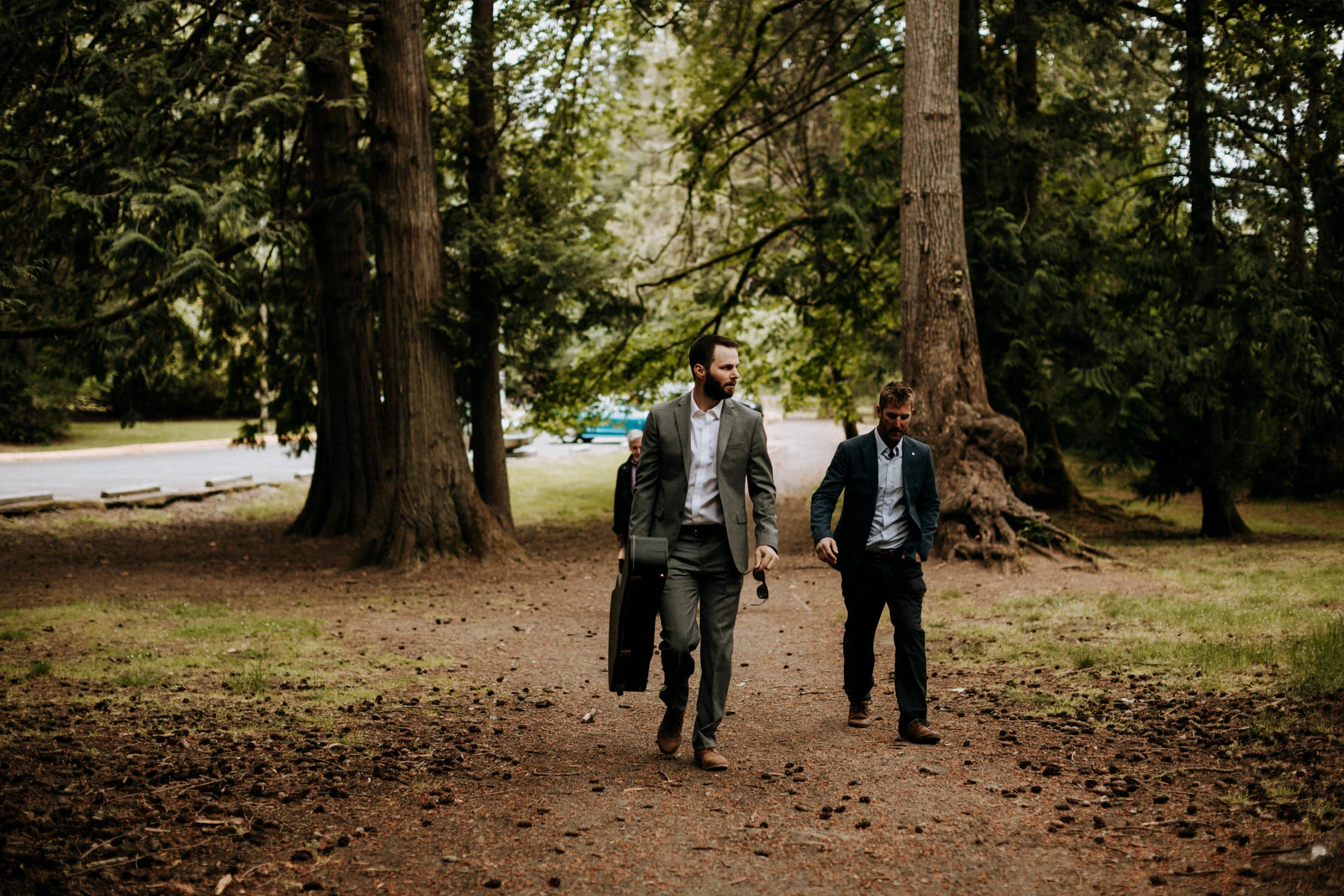 groomsmen walk to forest elopement at Mount Doug in Victoria BC
