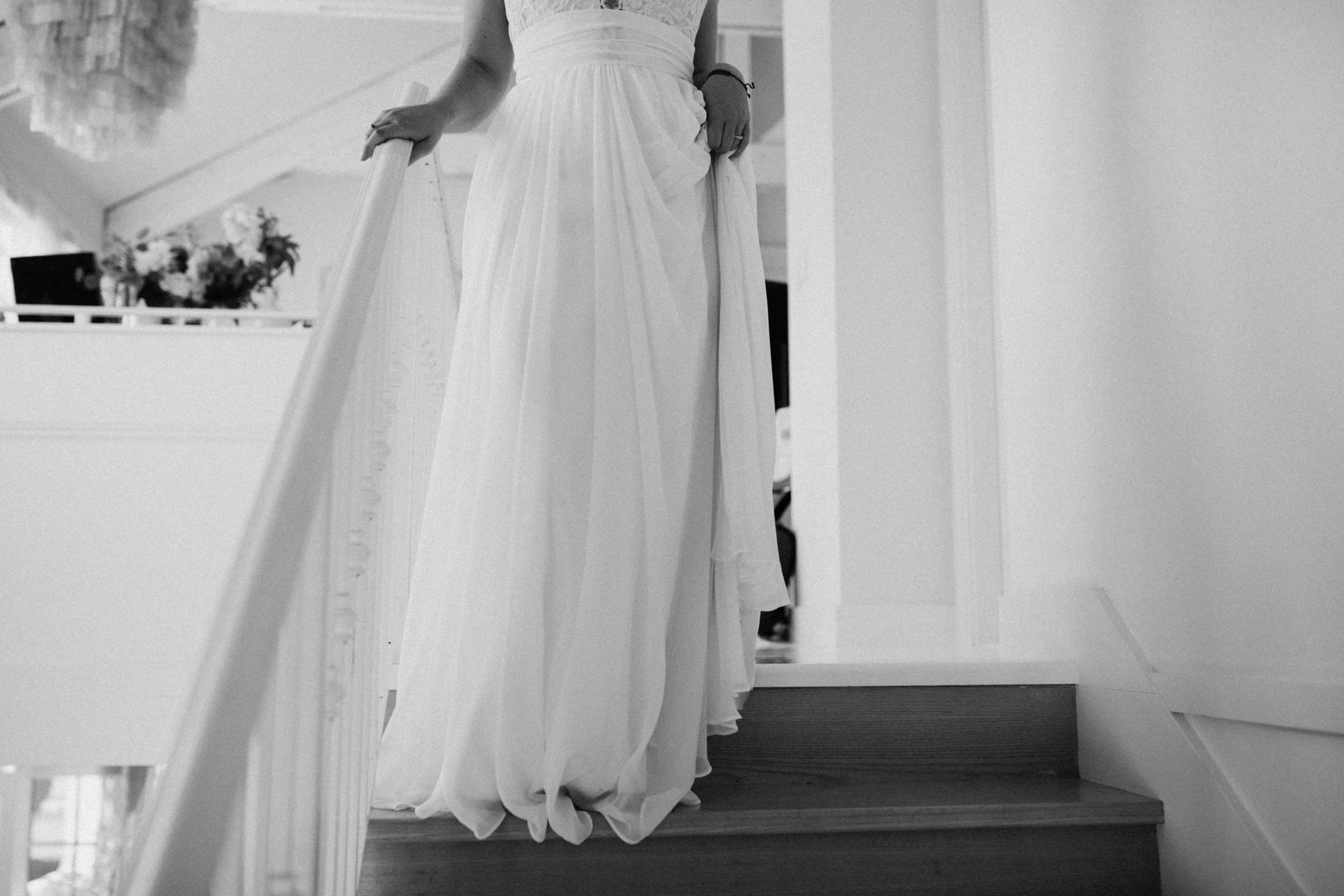 bride walking down stair West Vancouver backyard wedding photographer