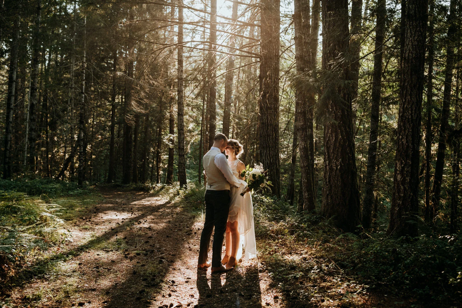 bride and groom dance in forest Port Alberni wedding Photographer