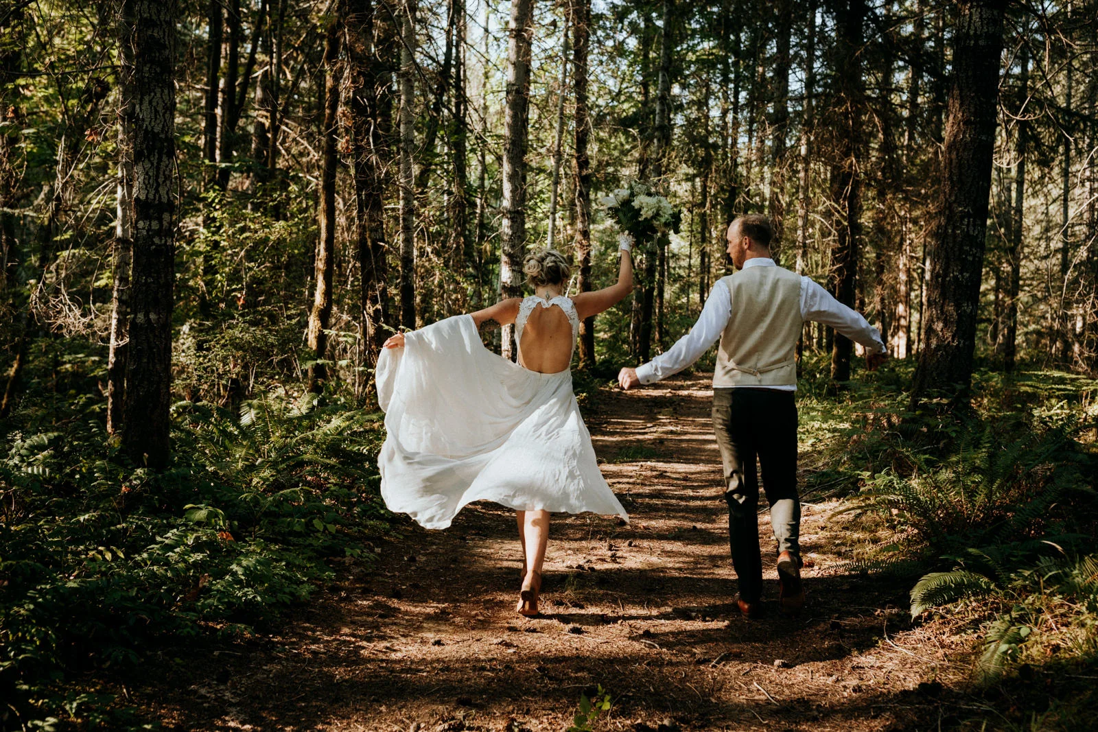 bride and groom dance in forest Port Alberni wedding Photographer
