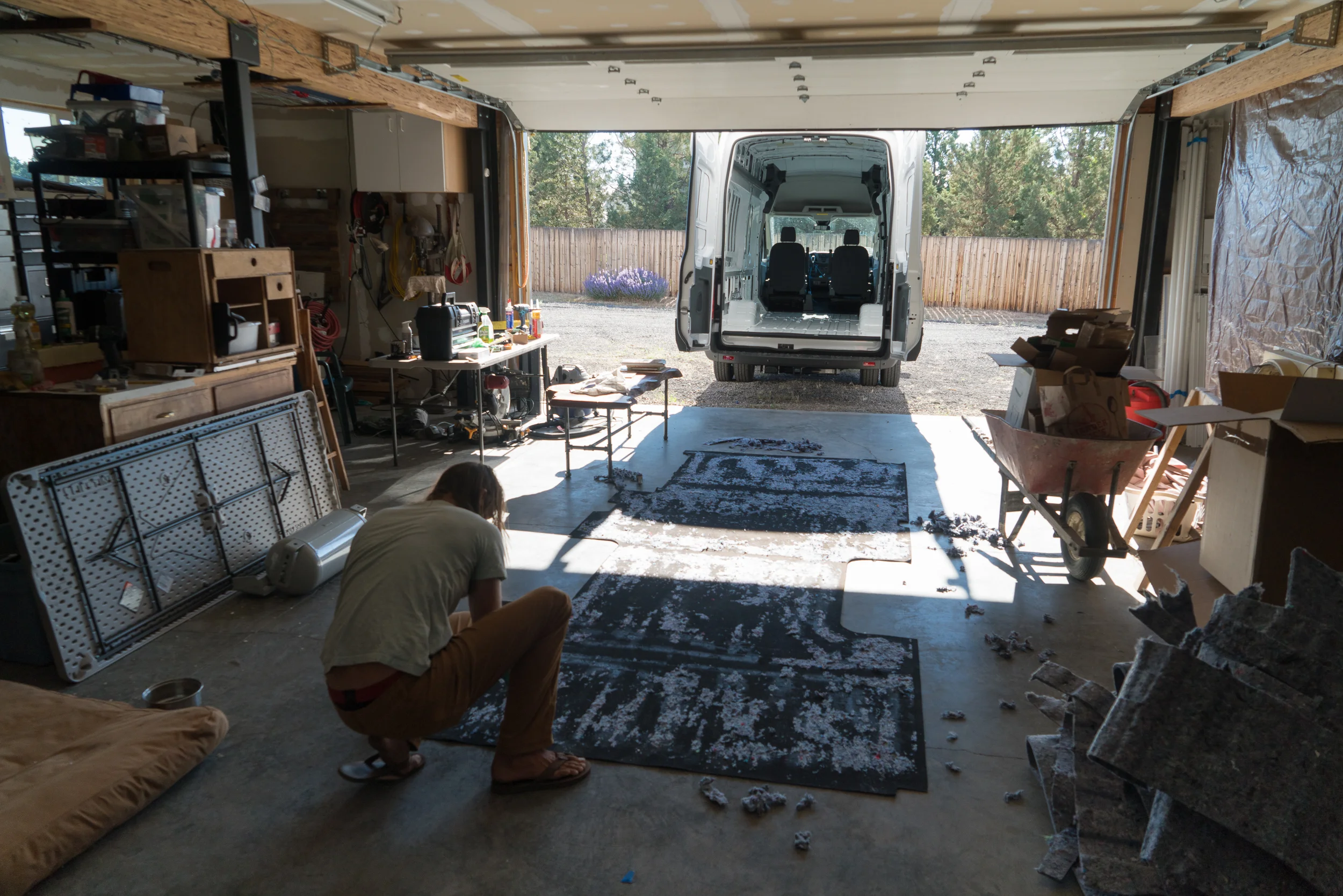 Removing the original mat and insulation that came with the van