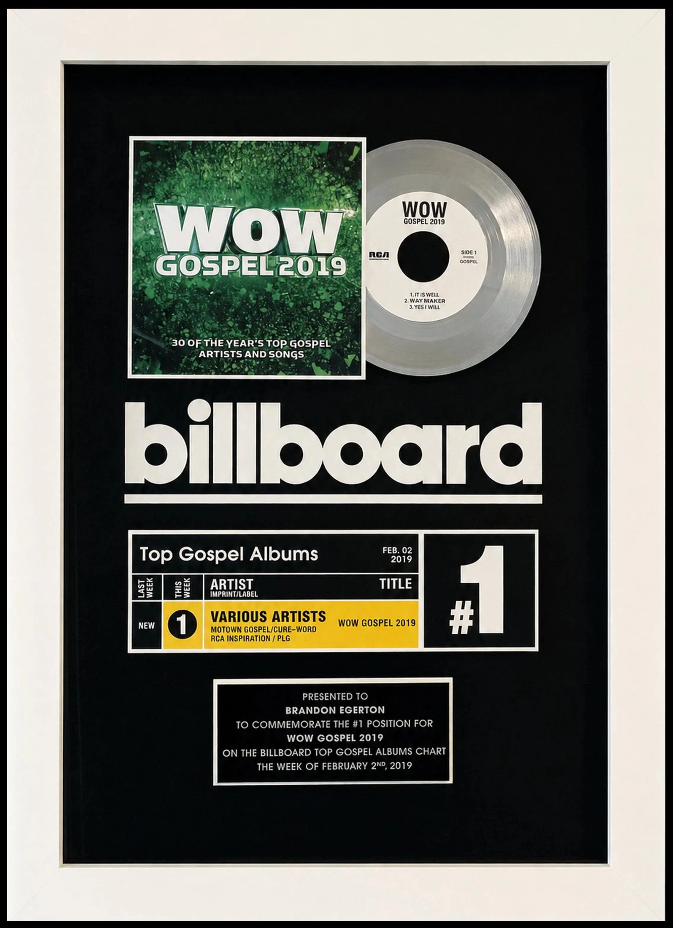 A Billboard #1 Award with a display of a framed first place certificate for top gospel albums of the week, awarded to various artists for their album WOW Gospel 2019 for the week of February 2, 2019. Presented to Brandon Egerton.