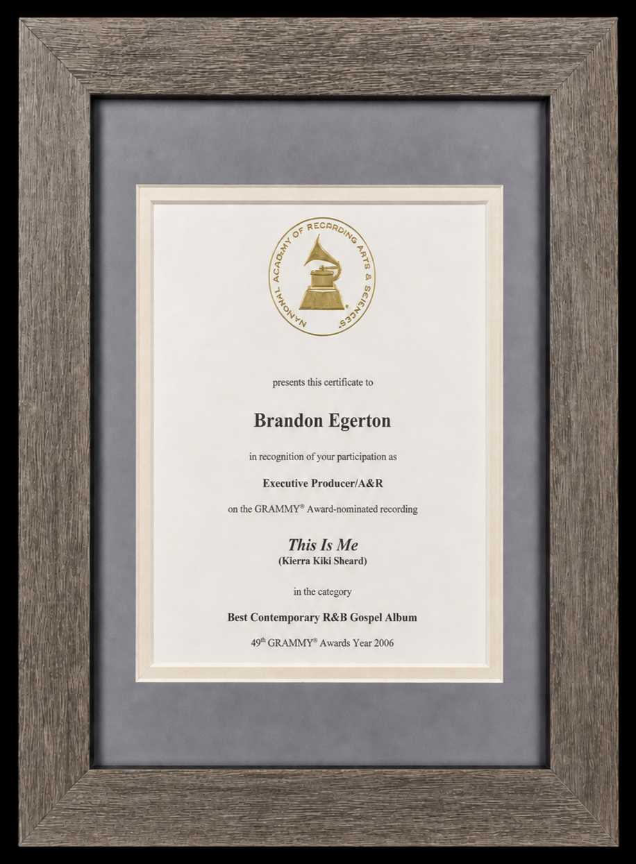 Certificate of achievement awarded to Brandon Egerton for participation as Executive Producer/A&R for the album "This Is Me" by Kierra Kiki Sheard, recognized at the 49th Grammy Awards in 2006. The certificate features a gold Grammy logo at the top a