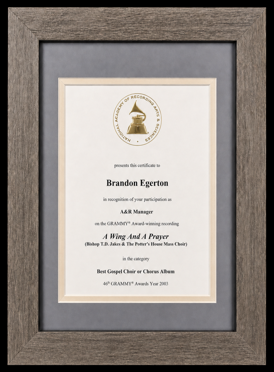 Framed Grammy award winning certificate awarded to Brandon Egerton for Bishop TD Jakes and The Potter’s House Choir’s Best Gospel Choir or Chorus Album in 2003.