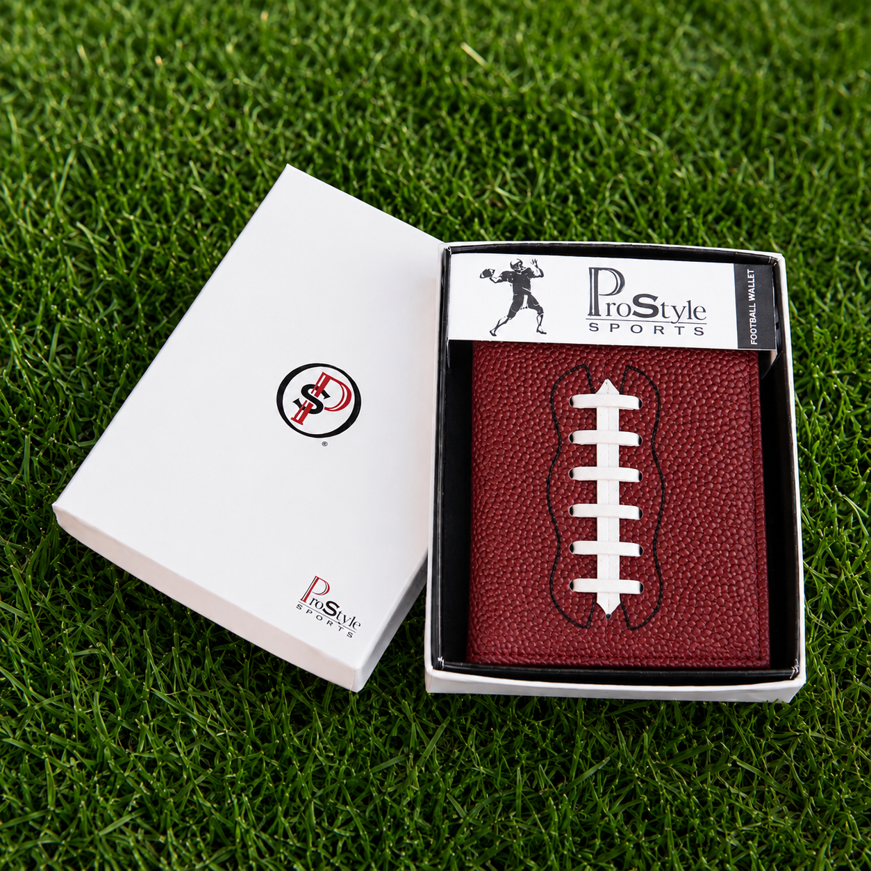 football wallet in box on grass.png