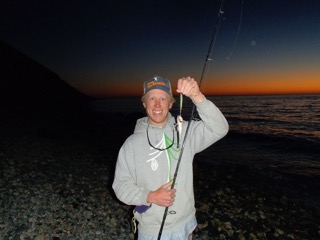 Keegan showing off his fishing skills.