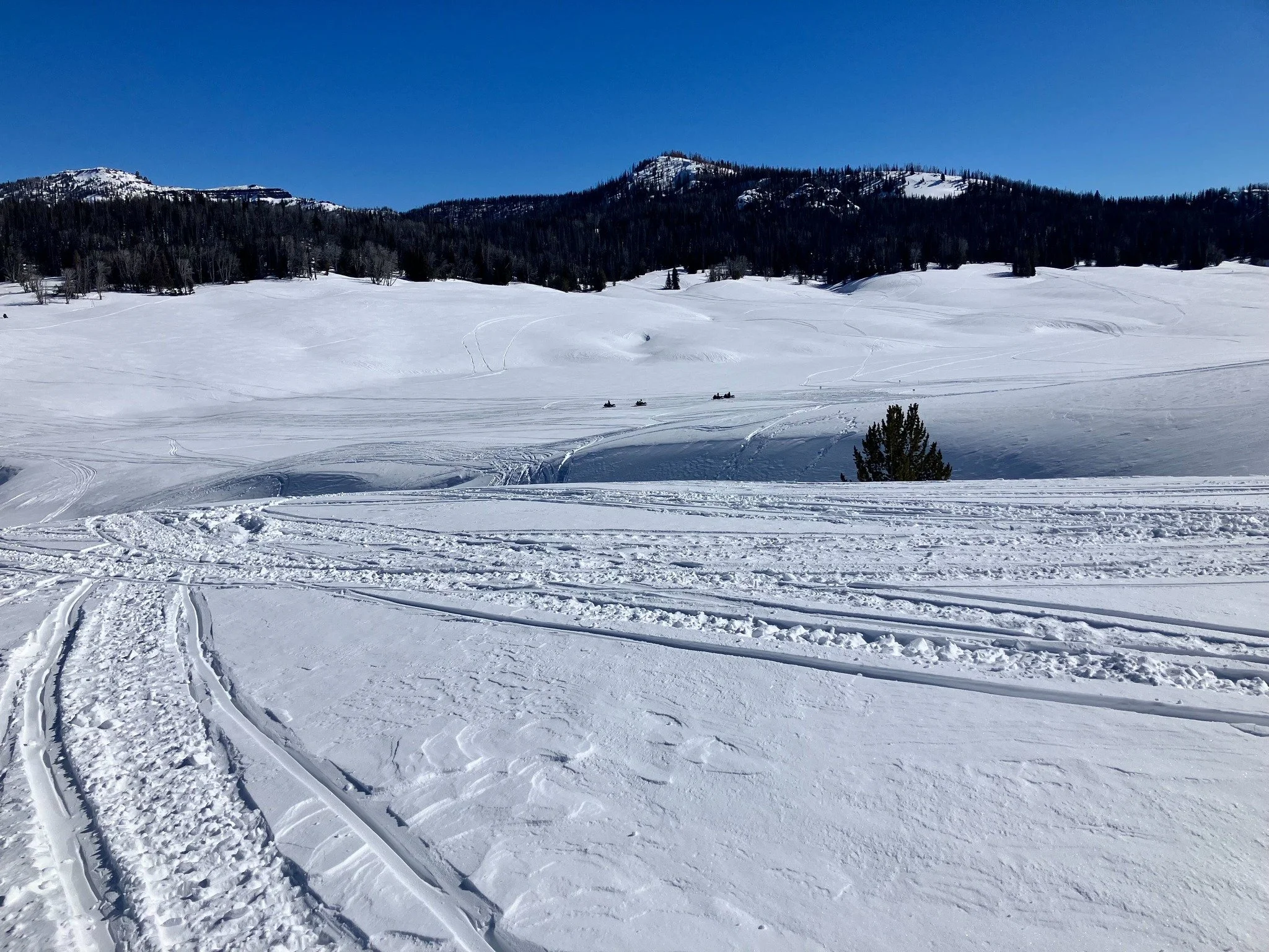 At 11:37 a.m. on Thursday, February 26, Teton County Search &amp; Rescue received an emergency alert for an injured snowmobiler on Togwotee Pass. The snowmobiler, a 42-year-old male, had become injured after crashing into a ravine between the X and K