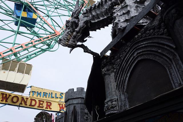 A demon guards a ride at modern Coney.