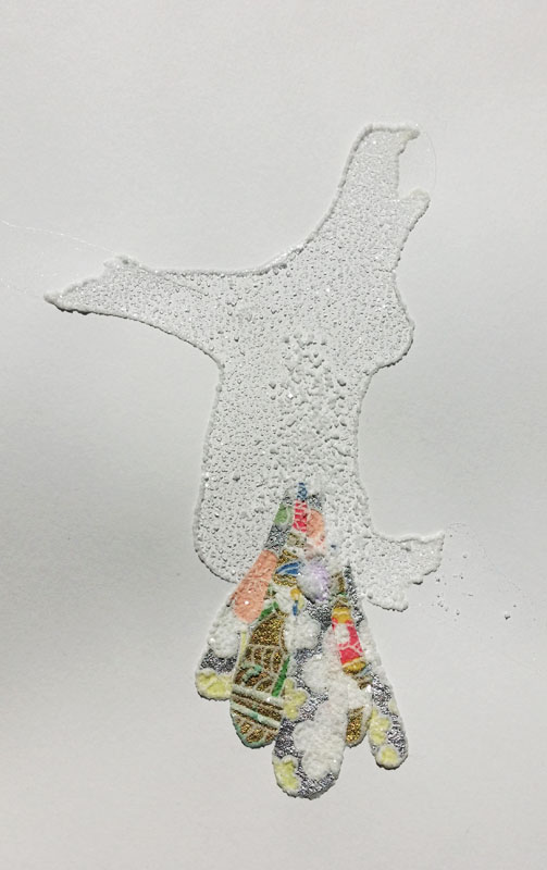 Gold and silver foiled origami paper. See how the salt crystals only clung to the un-foiled white paper? That was unexpected.