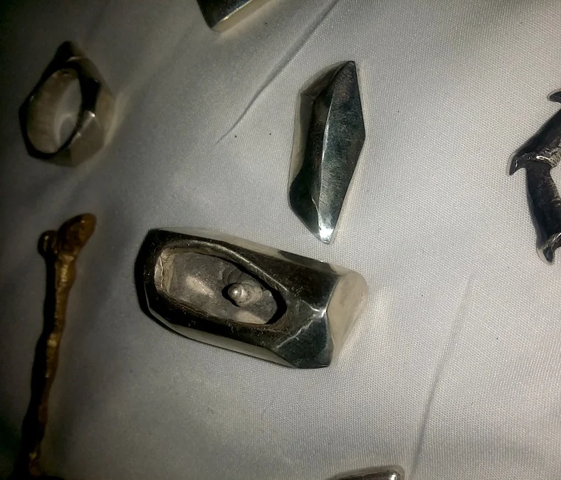 A variety of xenon-cast sterling silver and brass objects from Penland (2014)