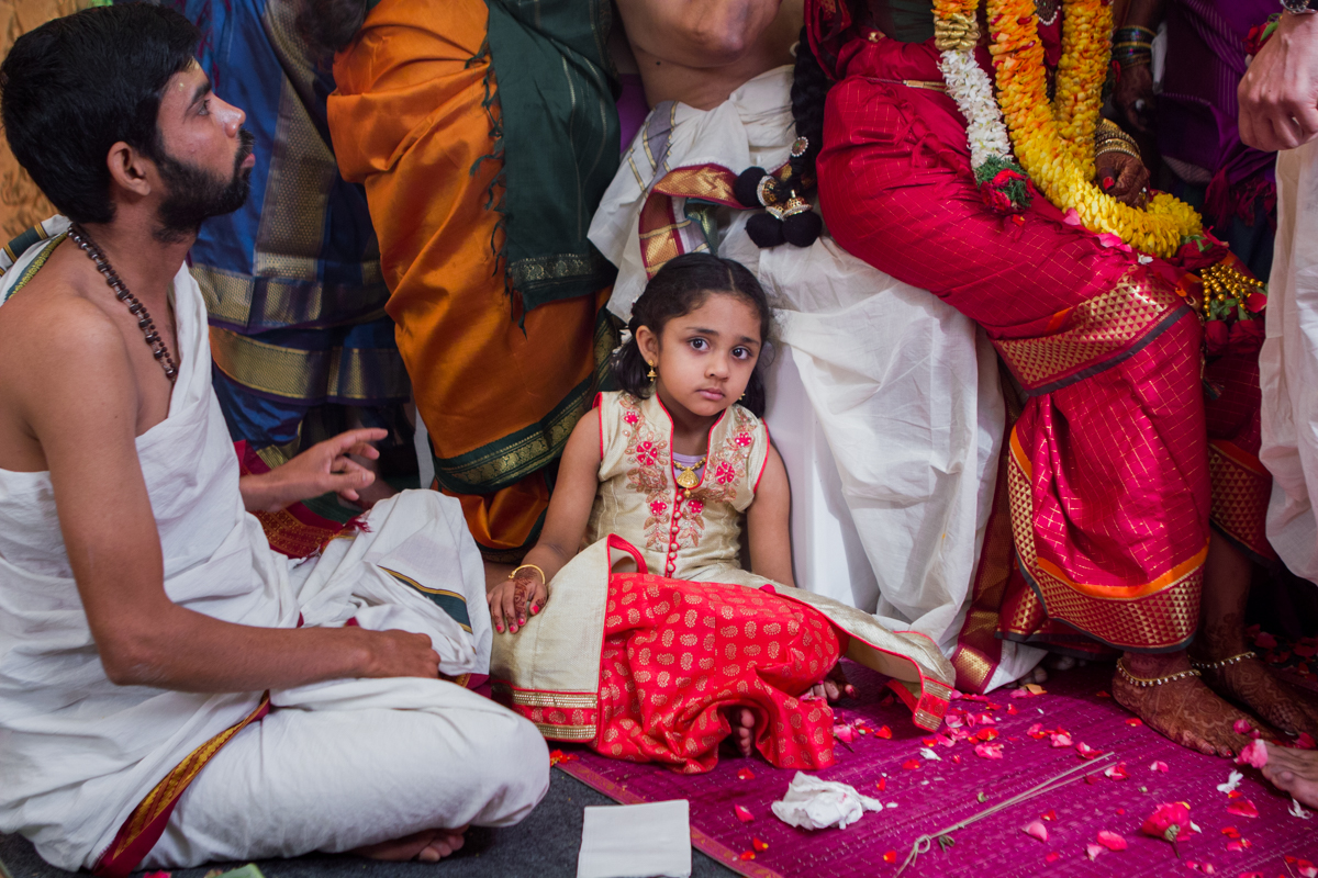 and here is Aanya, half way through the wedding, energy levels are visibly down but she hangs in there, constantly by the side of her aunt, the bride. 