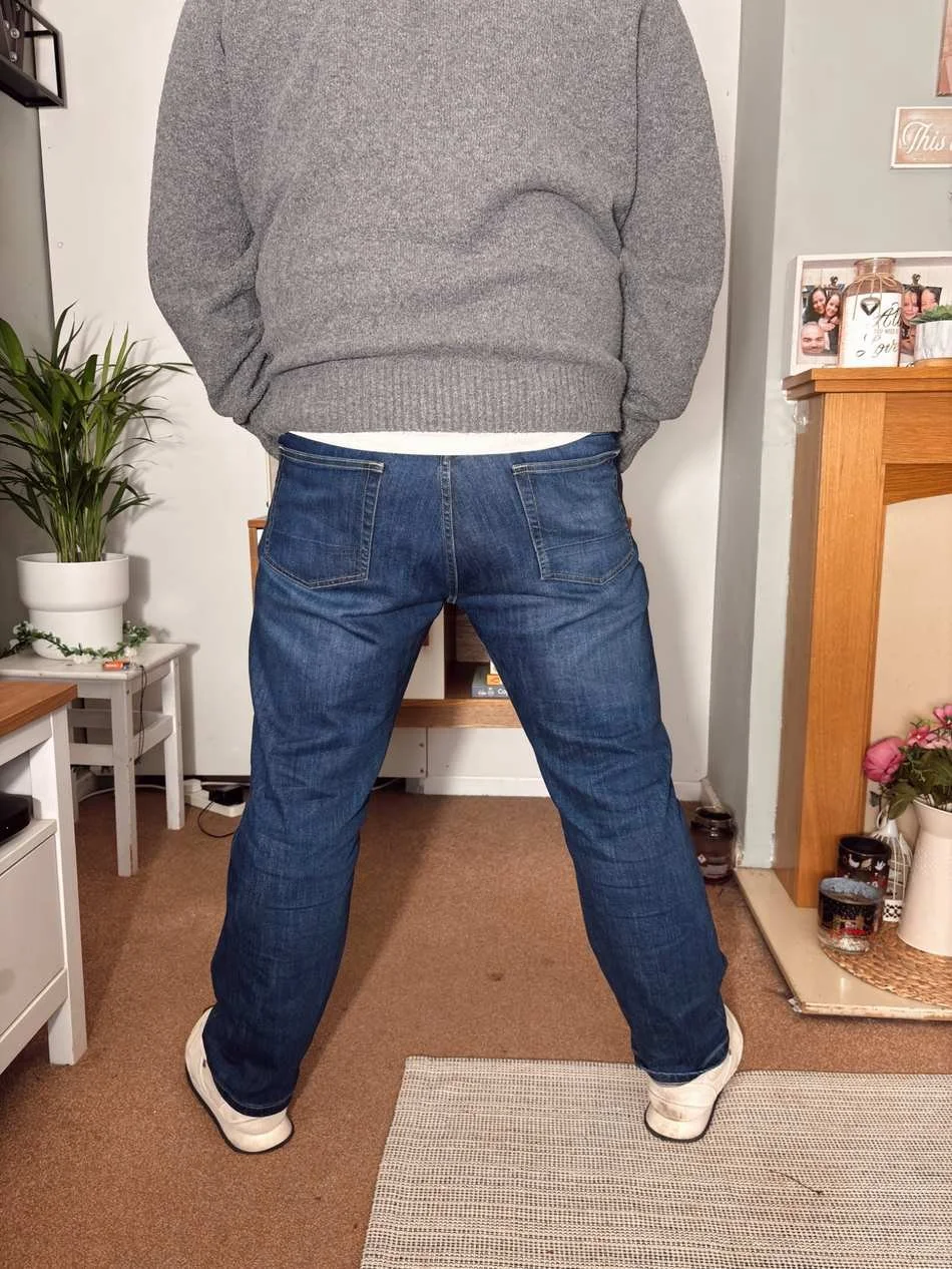 Back view of the Bluffworks Departure Jeans regular fit showing cut and pockets