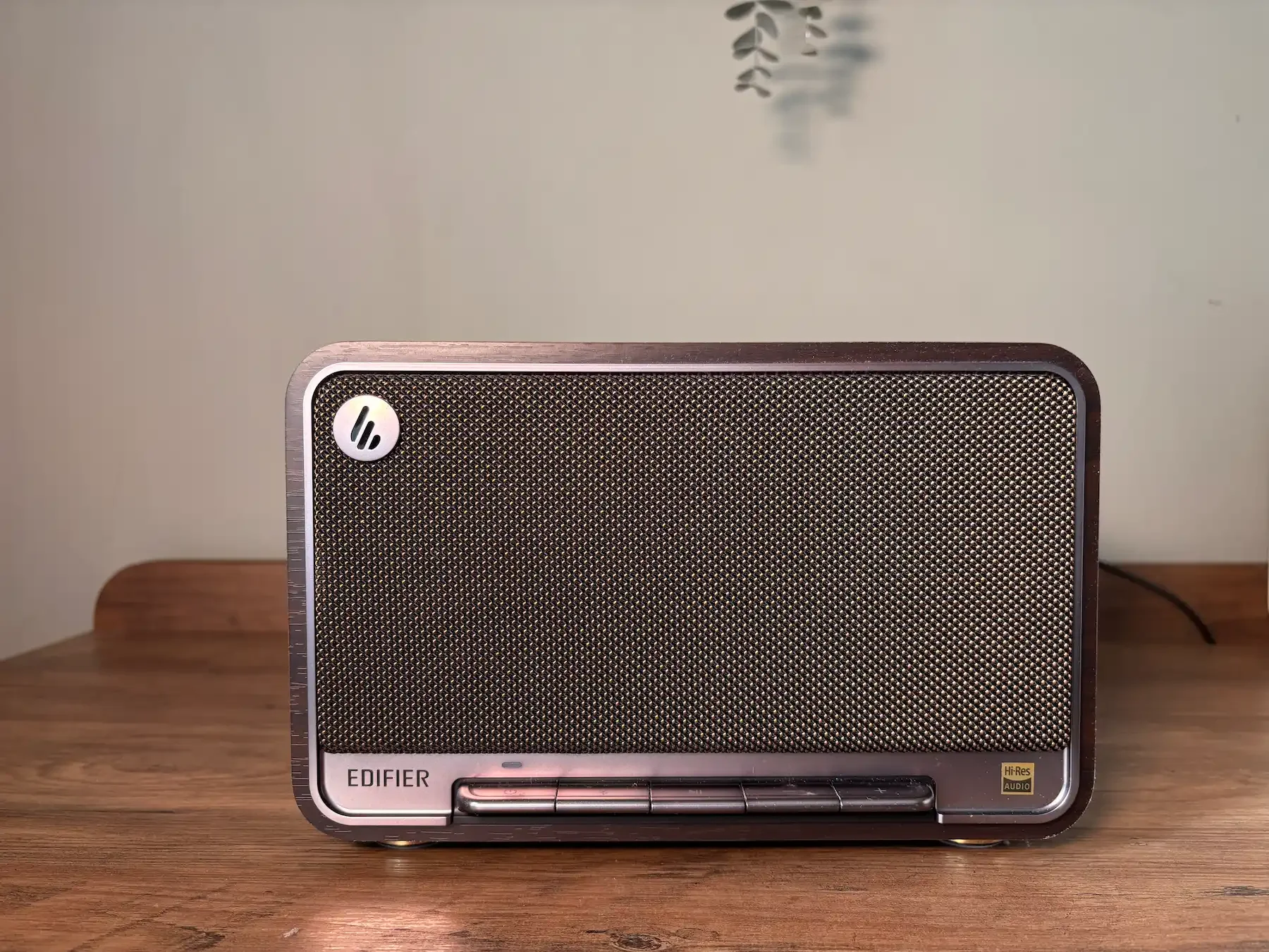 Close-up of the Edifier D32 retro speaker showing the front grille, buttons and Hi-Res Audio badge