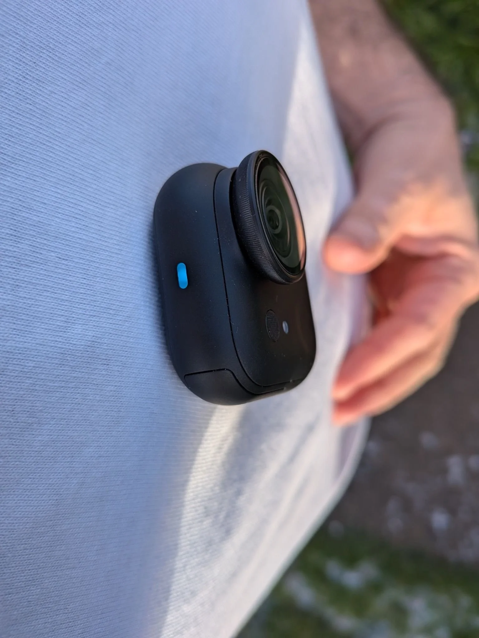 Insta360 Go Ultra worn on chest using magnetic pendant for POV filming