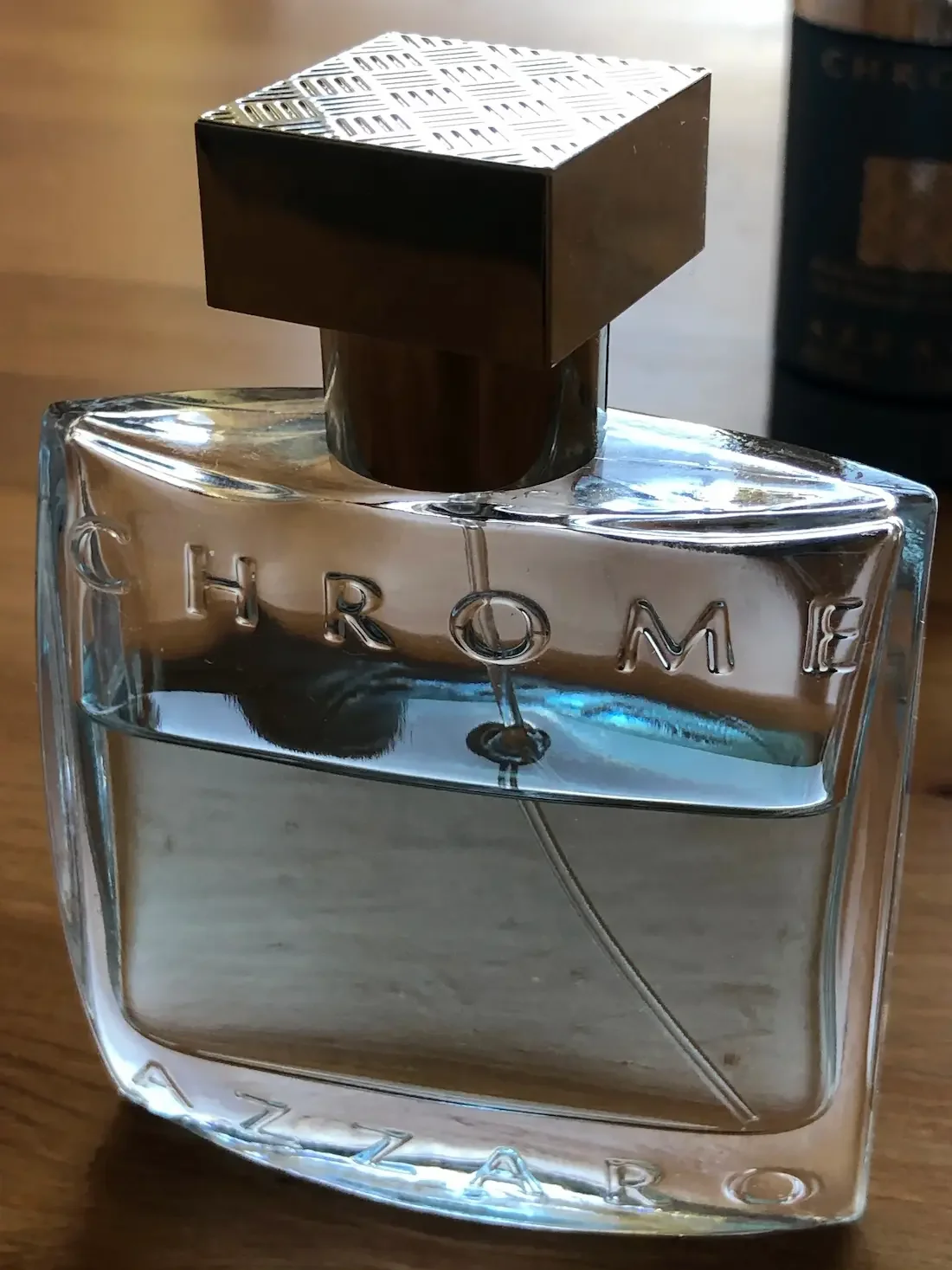 Azzaro Chrome bottle on a table