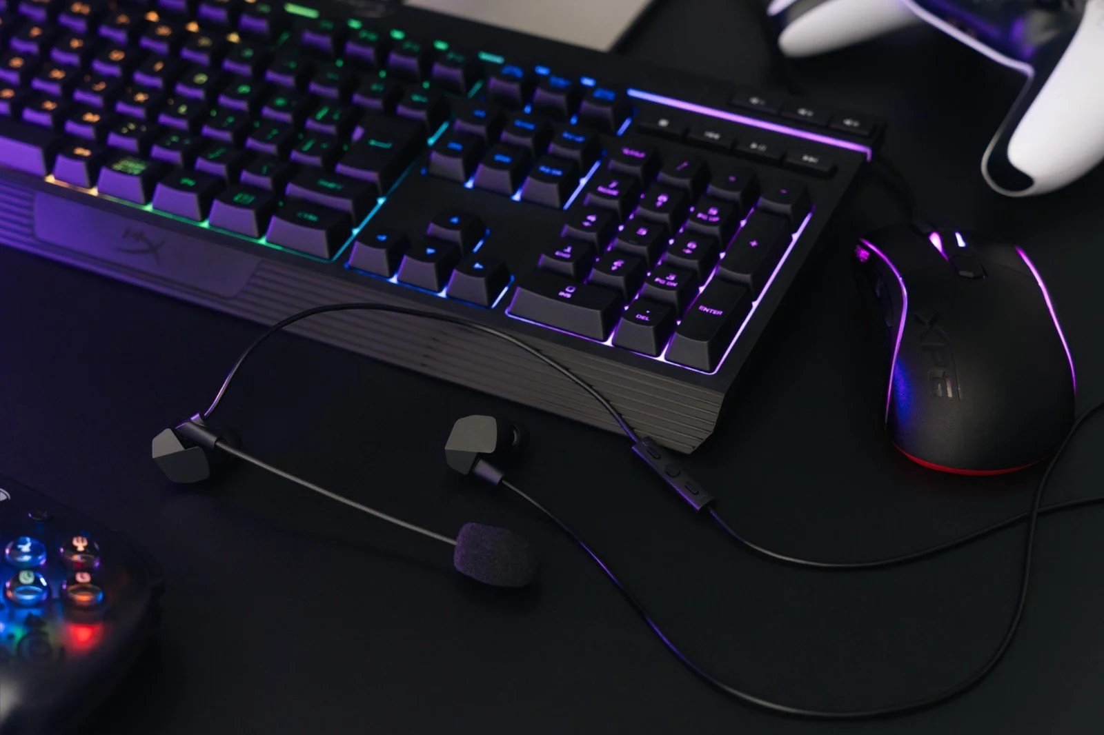 Final VR3000 gaming earphones with mic on RGB keyboard desk setup
