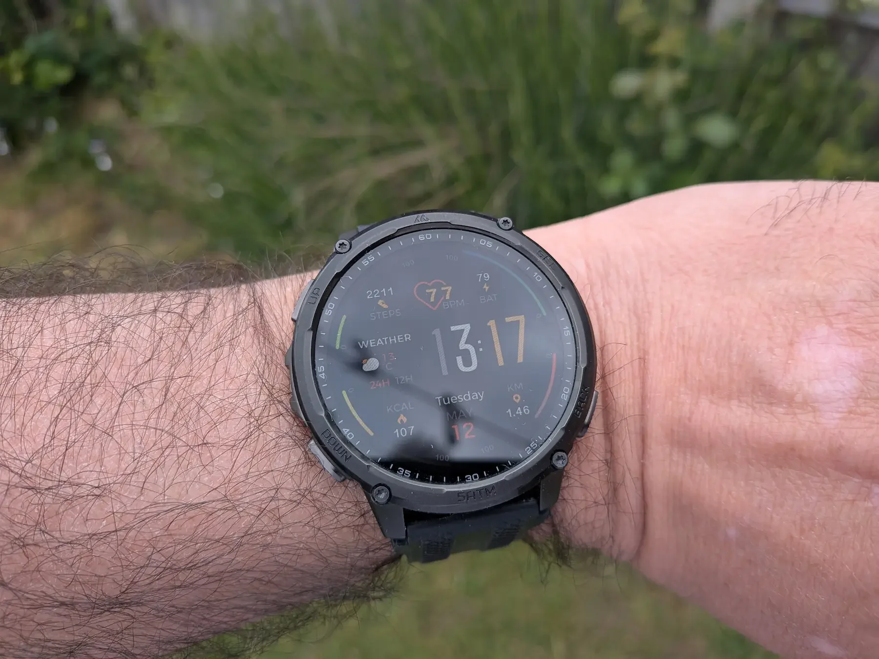 Kospet Tank T4C rugged smartwatch worn outdoors during real-world testing