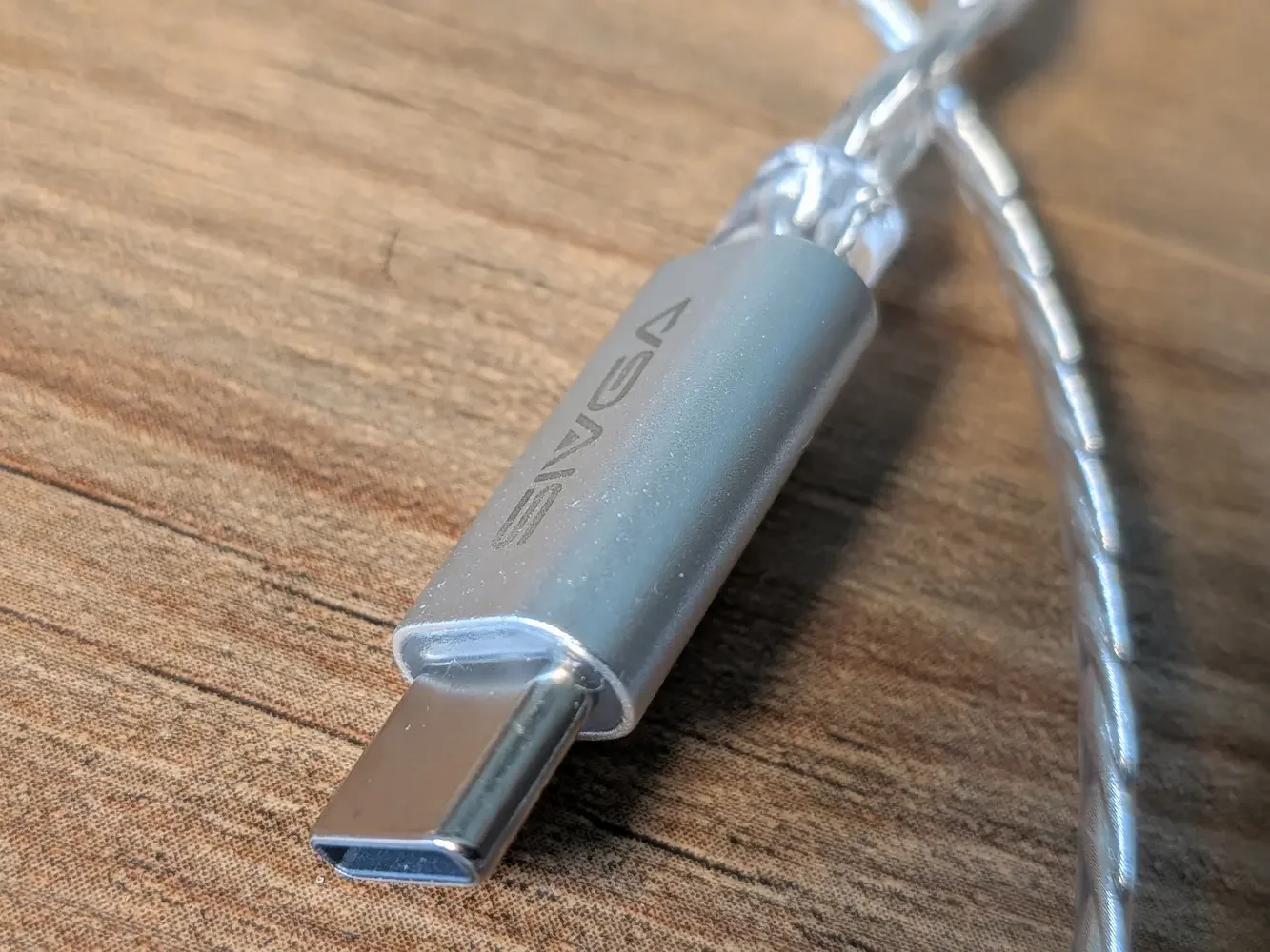 Close-up of the SIVGA M260 USB-C connector on a wooden desk