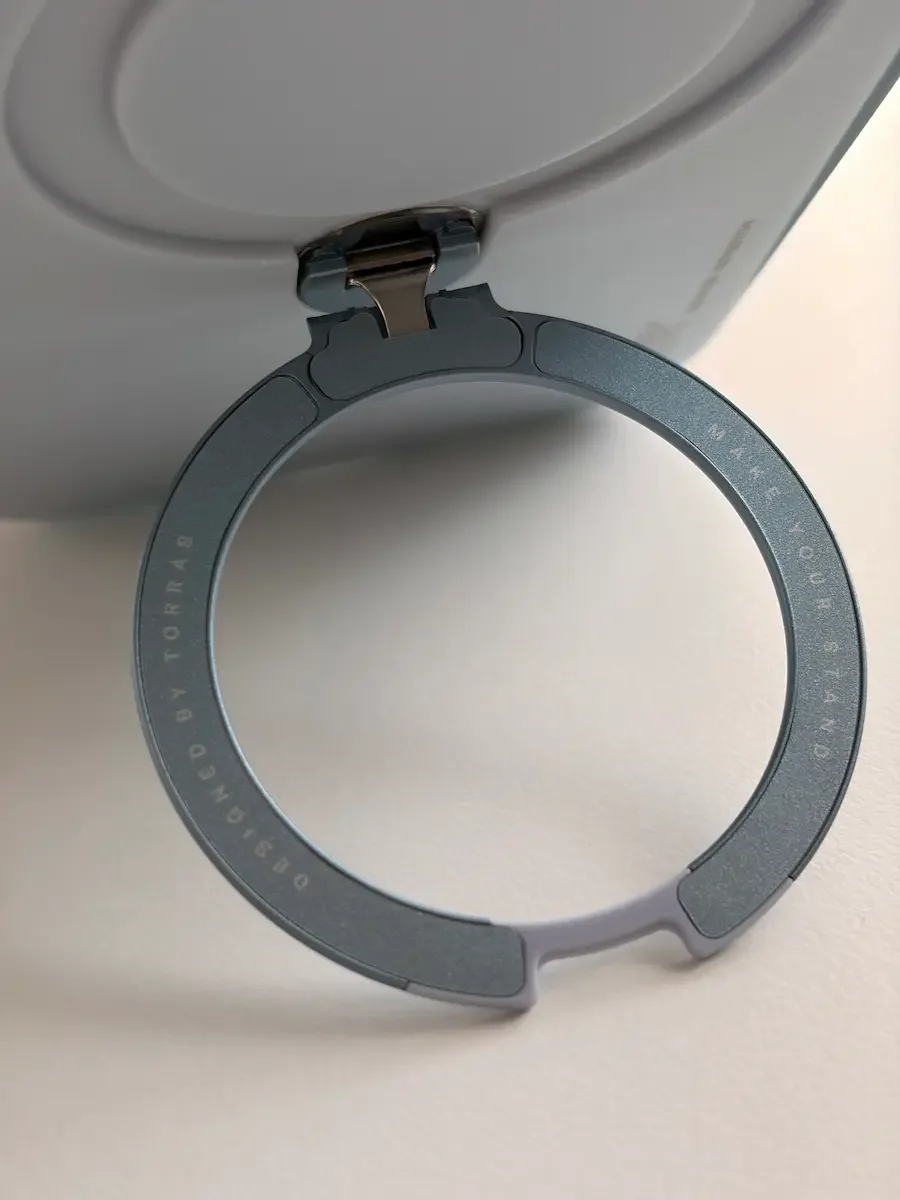 TORRAS Ostand Q3 Air Pro case with the circular rotating stand opened from the back.