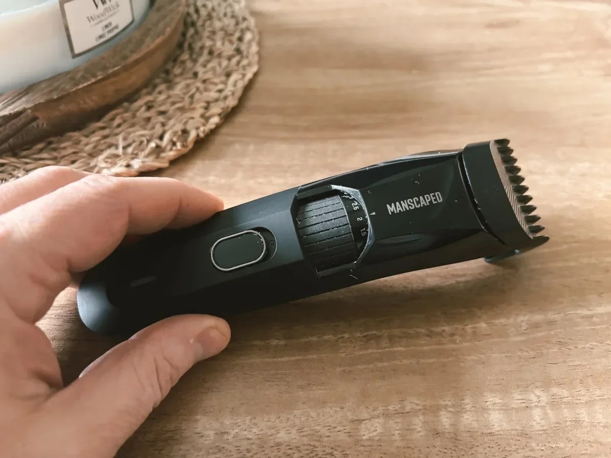 Jerome holding Manscaped The Beard Hedger