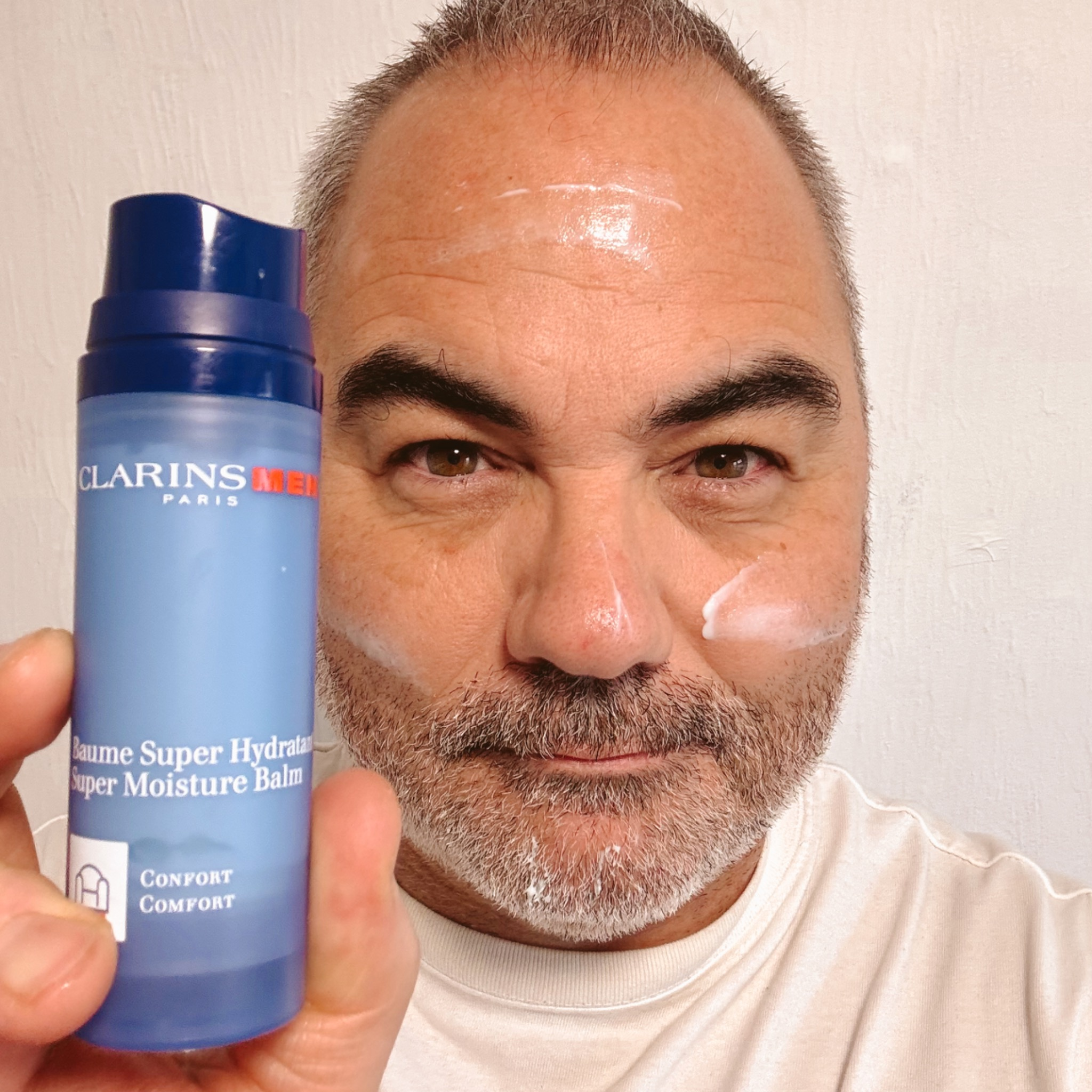 Applying Clarins Men Super Moisture Balm on the face, real-life skincare test by a 51-year-old men’s grooming reviewer