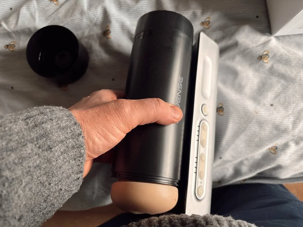 Me holding the Lovense Solace pro