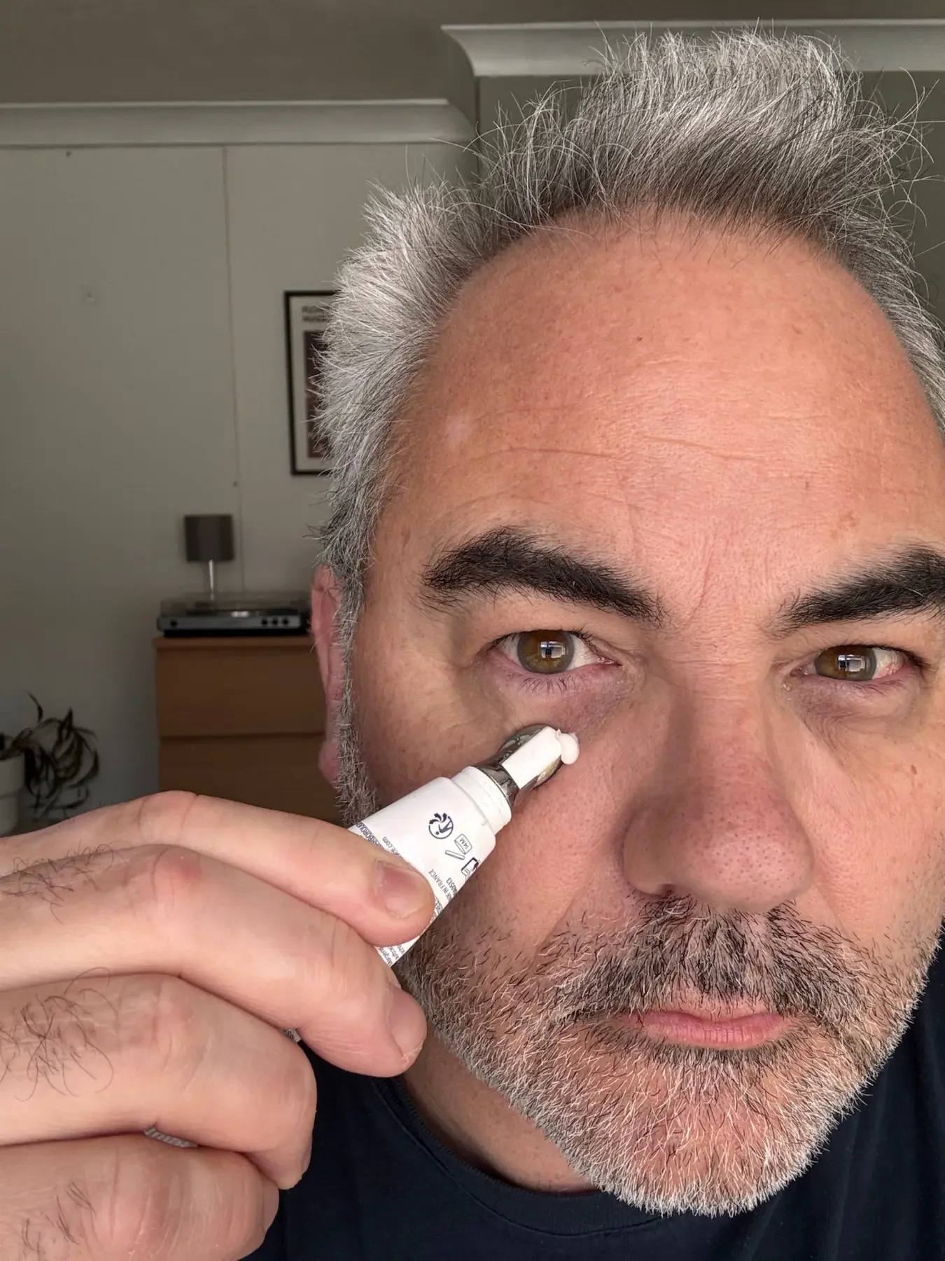 Jerome applying Horace Under-Eye Moisturiser with the cooling metal applicator