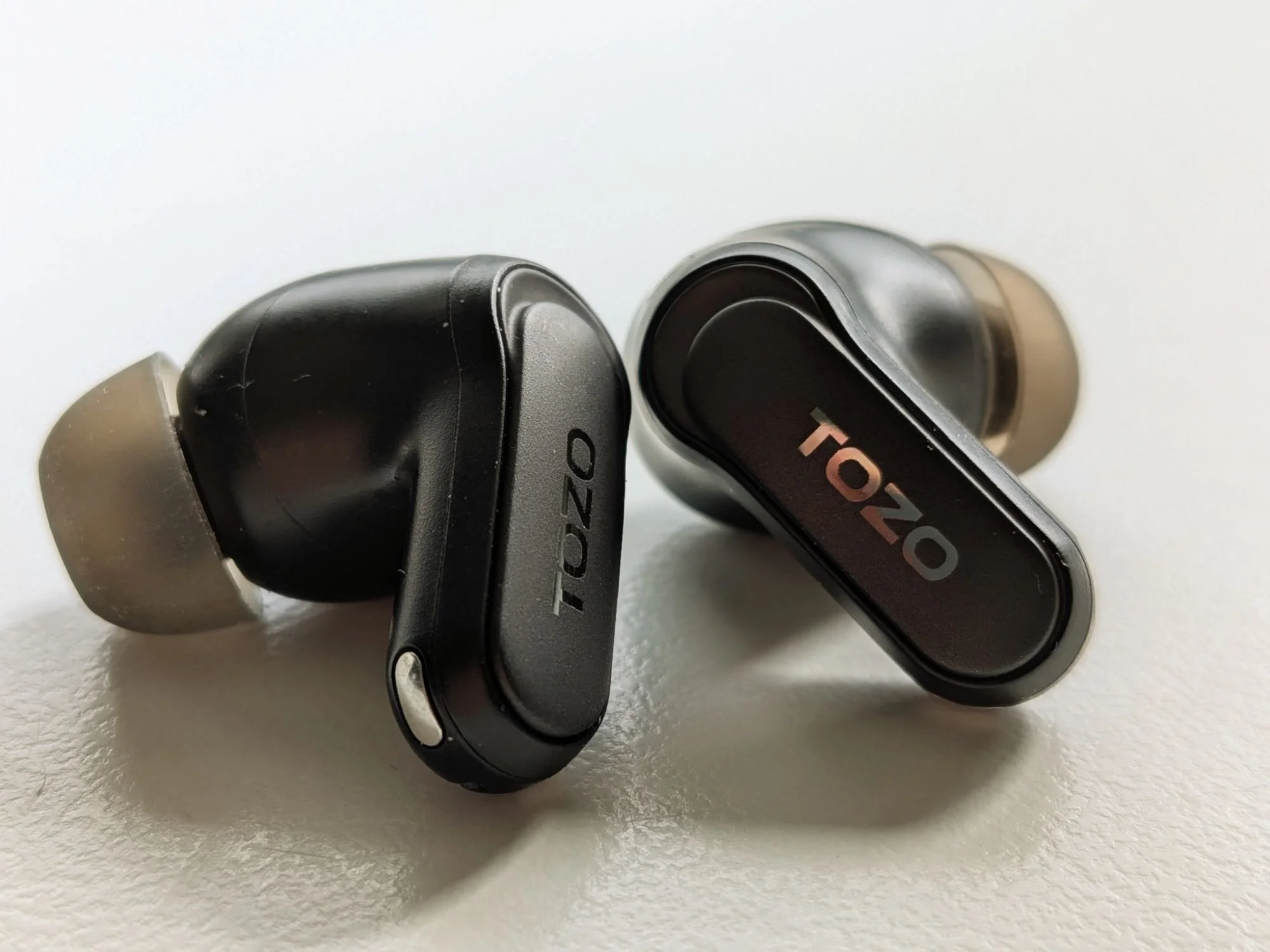 Product image of the TOZO NC20 Pro earbuds on a clean background, showing the design, finish and overall look of the affordable wireless earbuds.