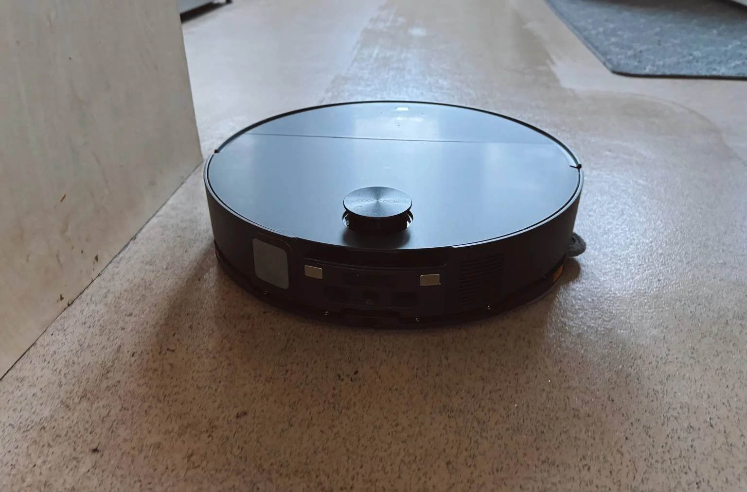 Roborock Saros 10 robot vacuum cleaning vinyl floor in UK family home