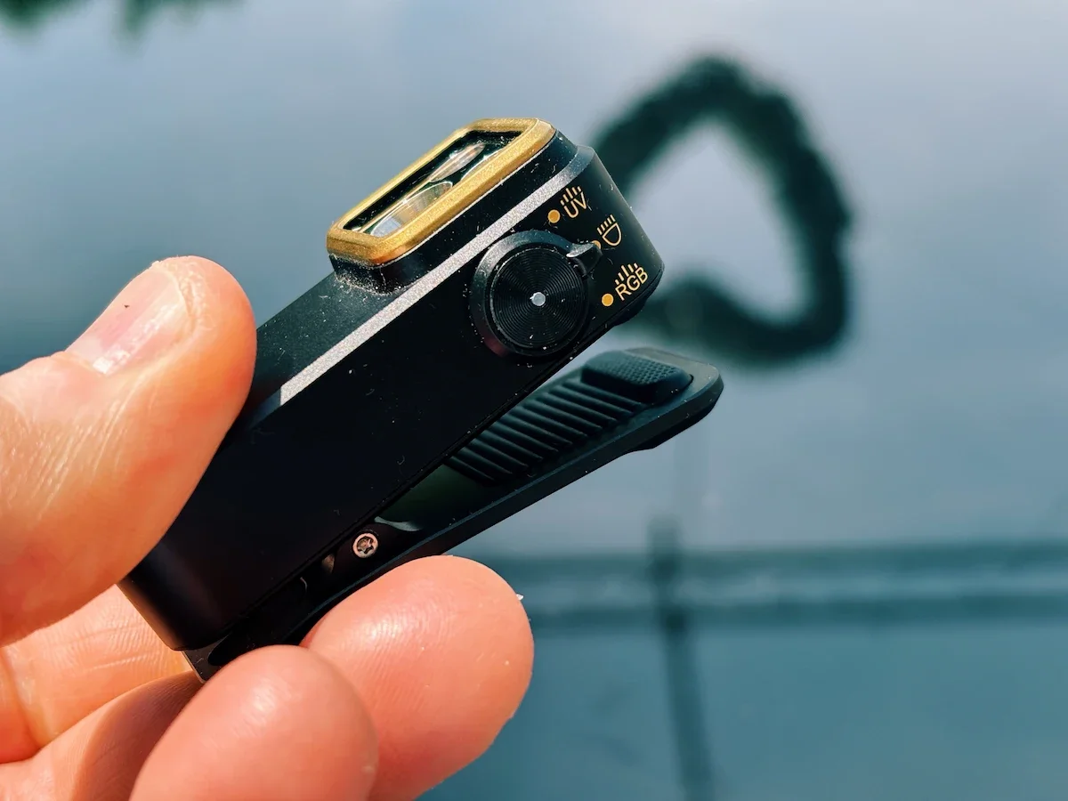 Rear view of the Olight Oclip Pro S showing the clip mechanism and product branding.