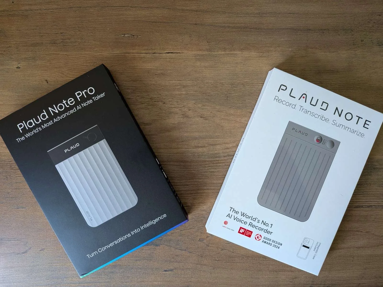 image showing the Plaud Note Pro box next to the original Plaud Note packaging, highlighting the design differences between both AI voice recorder models.