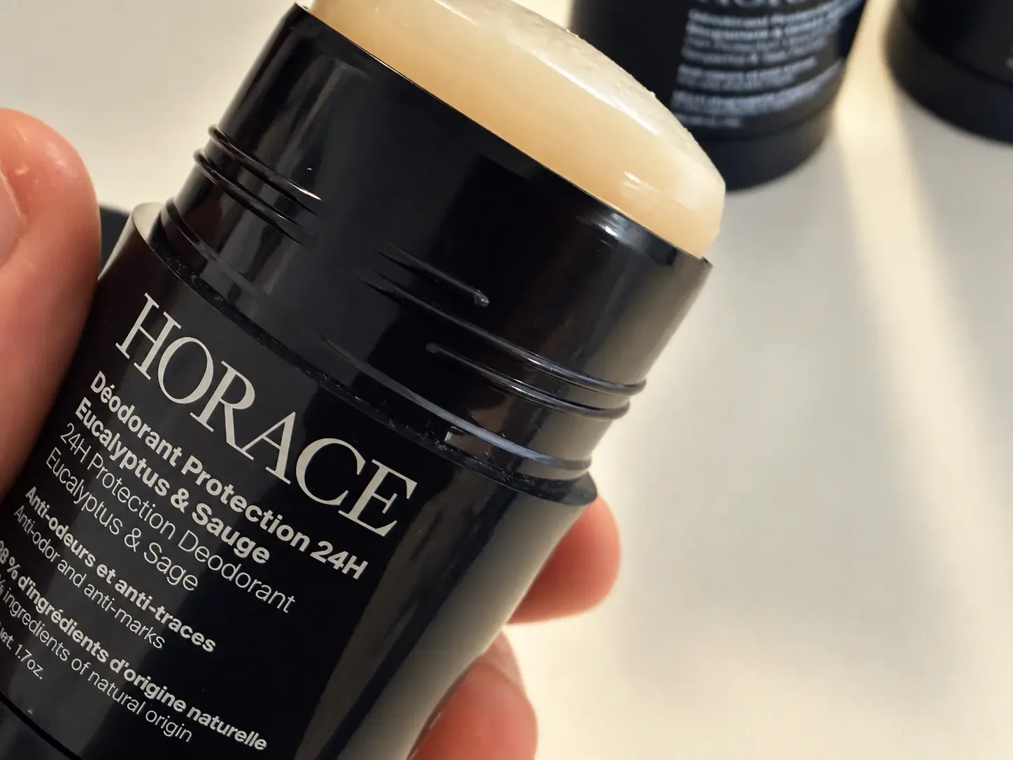 Close-up of the Horace Eucalyptus & Sage 24H Protection Deodorant stick with the solid deodorant exposed.