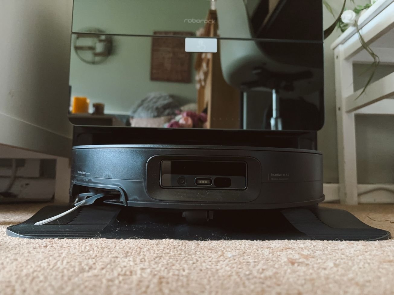 Roborock Saros 10 returning to its self-emptying dock