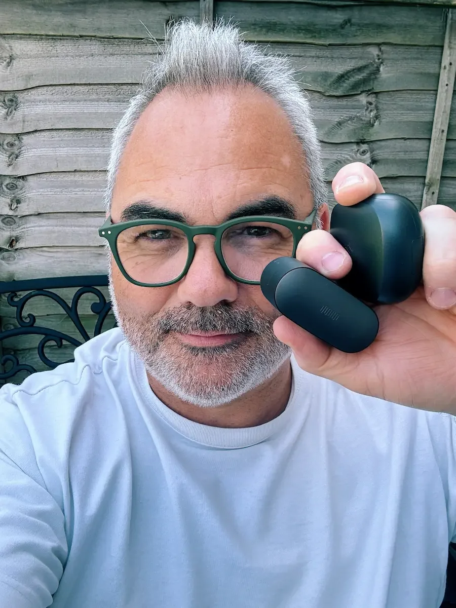 Status Audio Pro X earbuds shown during hands-on real-world testing.