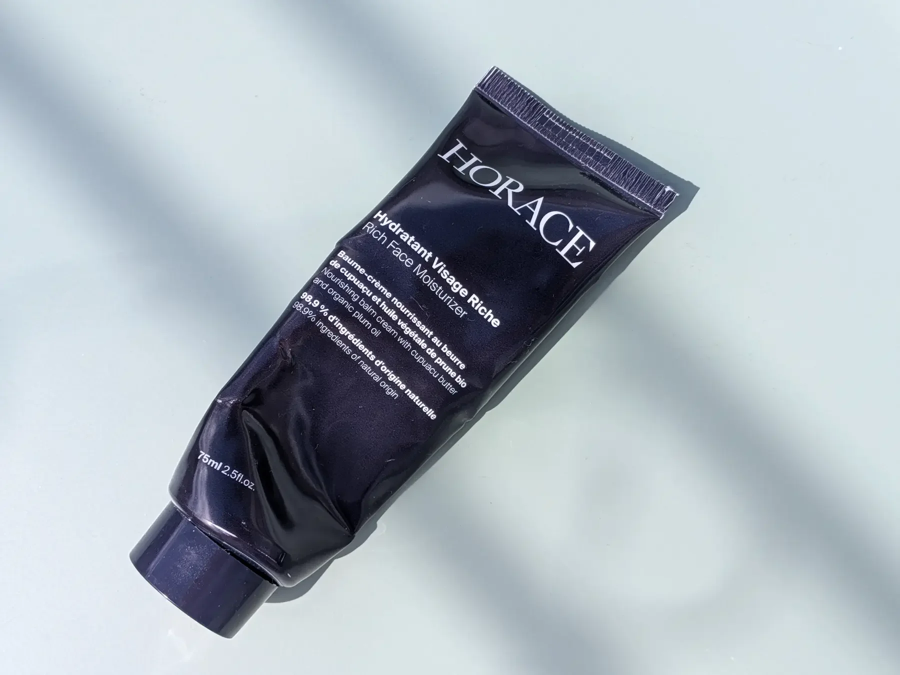 Horace Rich Face Moisturizer tube photographed on a light background for a men’s skincare review.