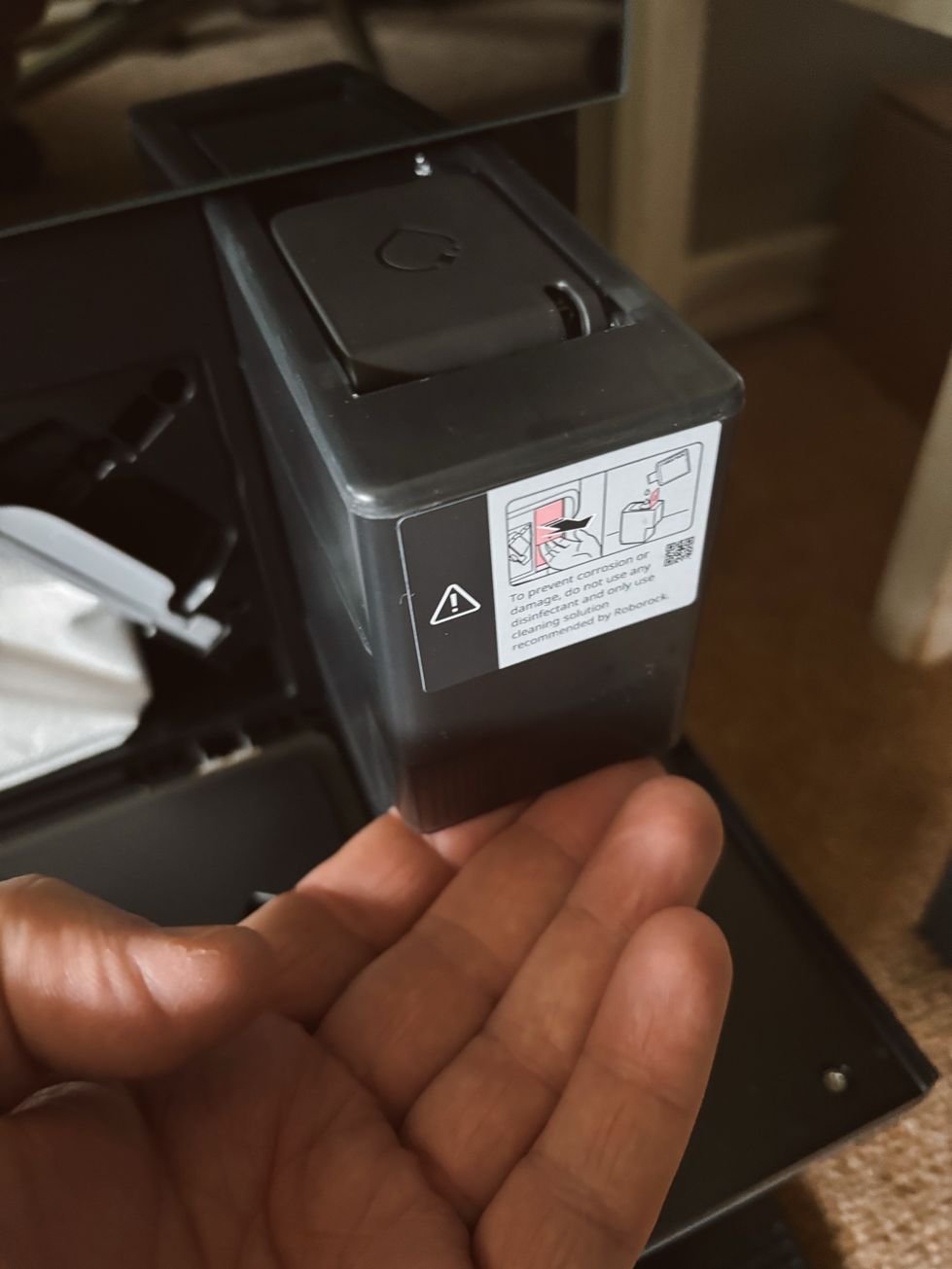 Roborock Saros 10 cleaning solution container inside dock