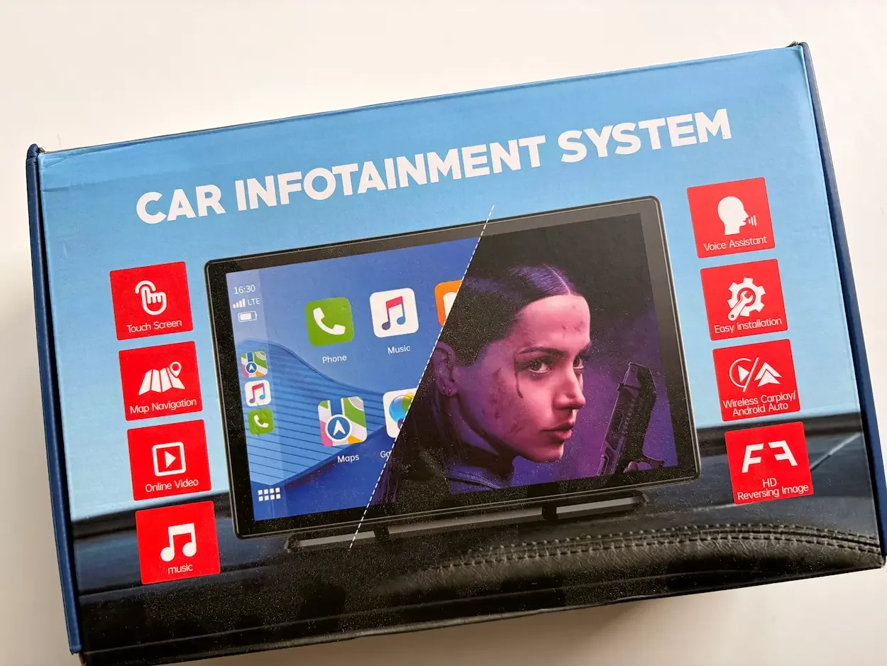 Retail box for the LAMTTO 11-inch car infotainment screen, showing its touchscreen, navigation, wireless CarPlay and Android Auto features.