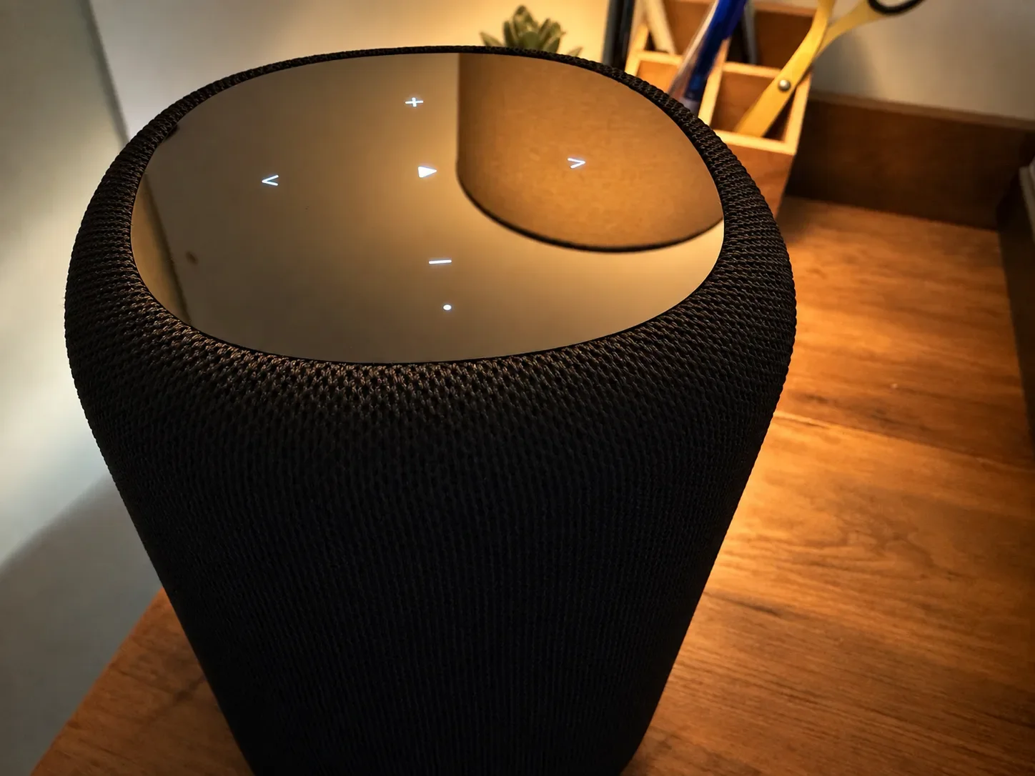 Top view of the WiiM Sound Lite showing the illuminated touch controls
