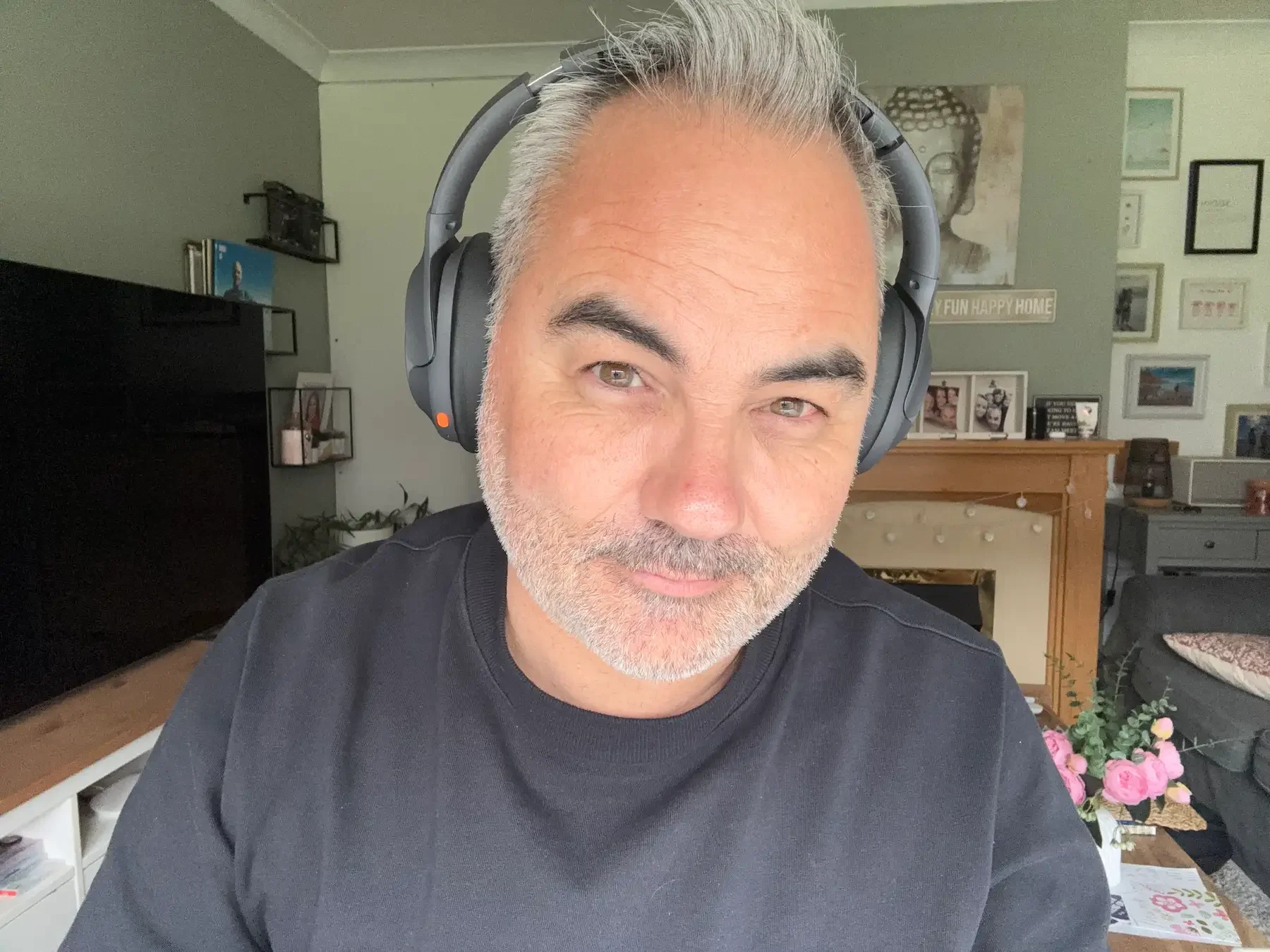 Jerome wearing the Tozo HT3 headphones during his hands-on review, testing comfort, fit, noise cancelling, and sound quality in real-world use.