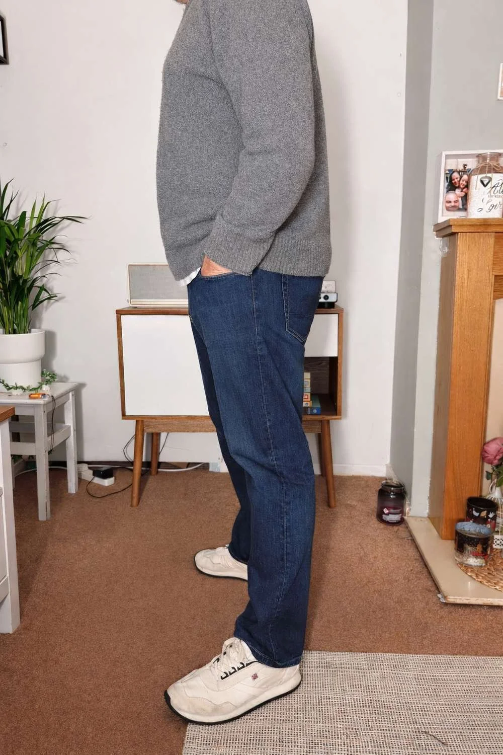 Side profile of the Bluffworks Departure Jeans regular fit during real-world wear
