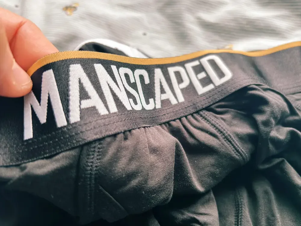 Jerome showing the Manscaped Boxers 2.0 elastic waistband