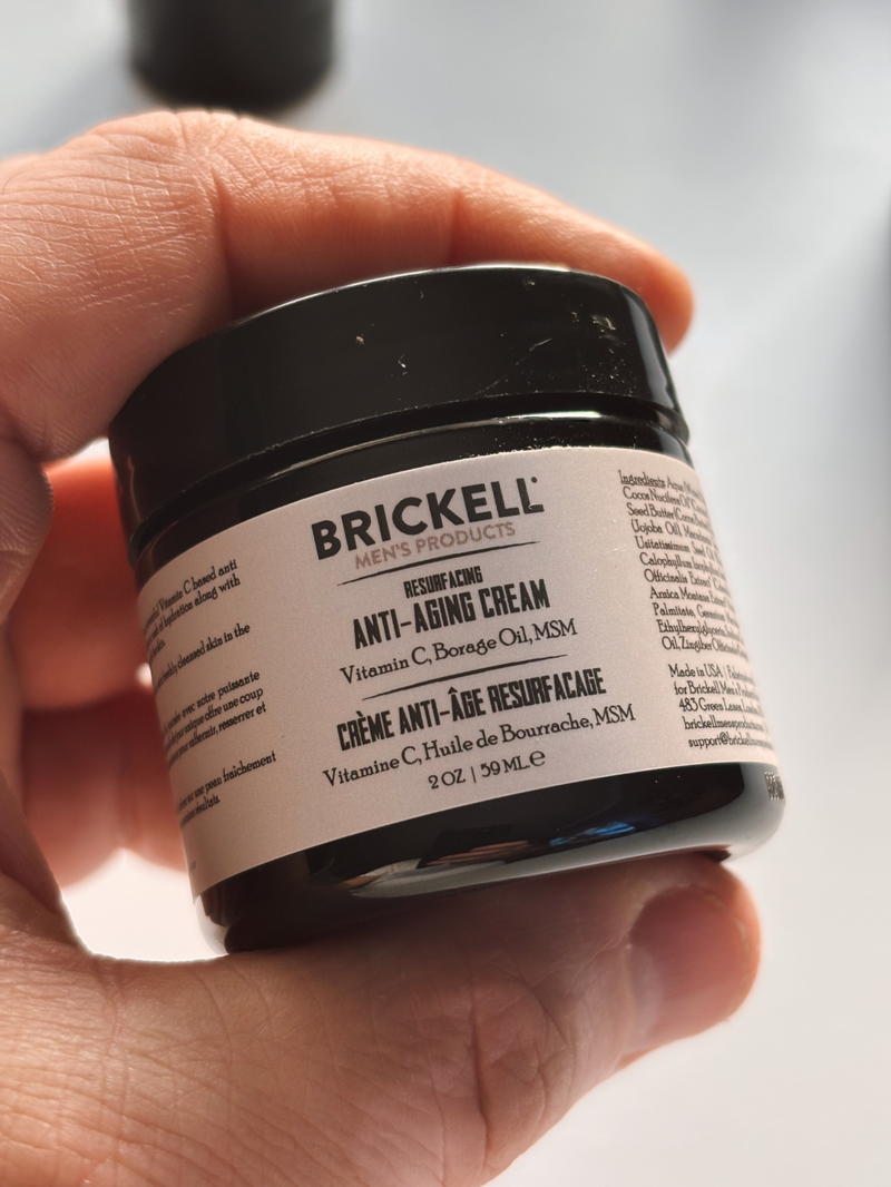 Me holding the Brickell Resurfacing Anti Aging Cream
