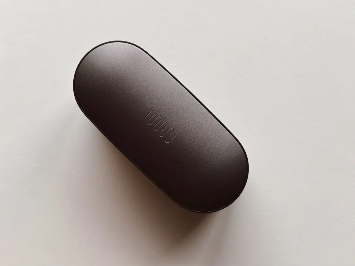 Status Pro X earbuds charging case top view